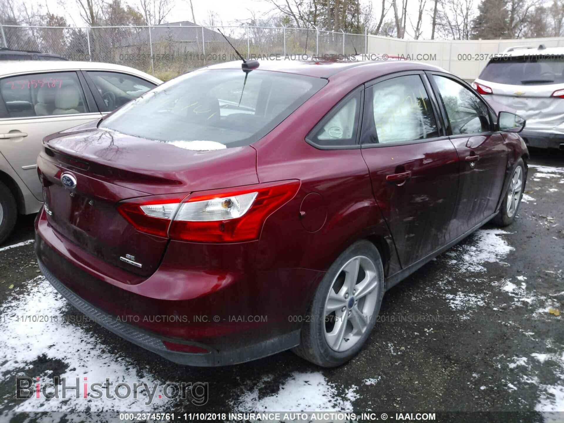 2014 Ford Focus - VIN: 1FADP3F22EL459680 - Photo 4