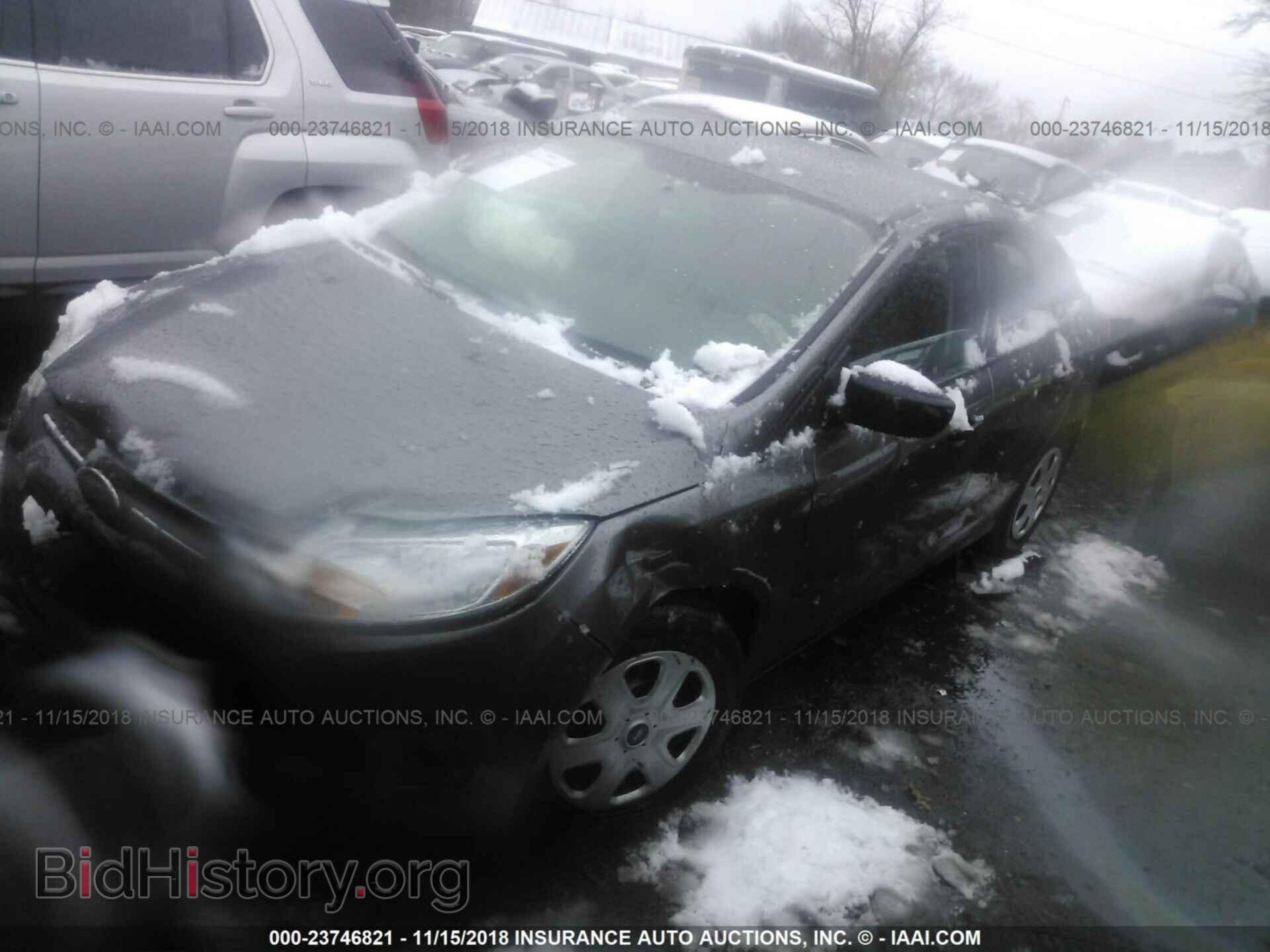 2014 Ford Focus - VIN: 1FADP3E26EL274985 - Фото 2