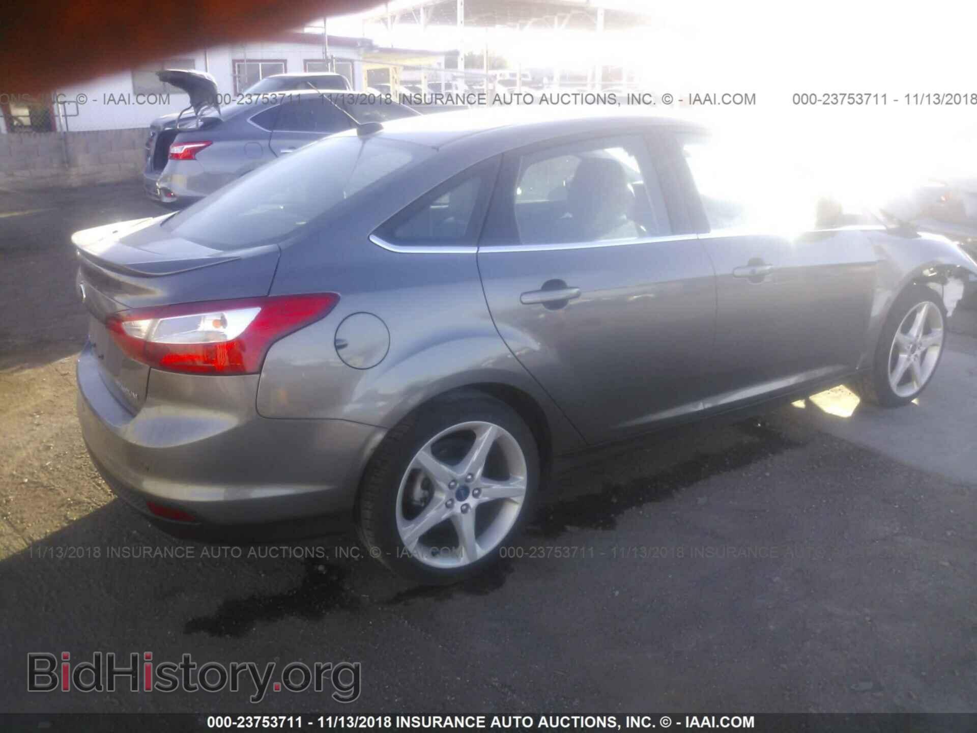 2014 Ford Focus - VIN: 1FADP3J22EL321399 - Photo 4
