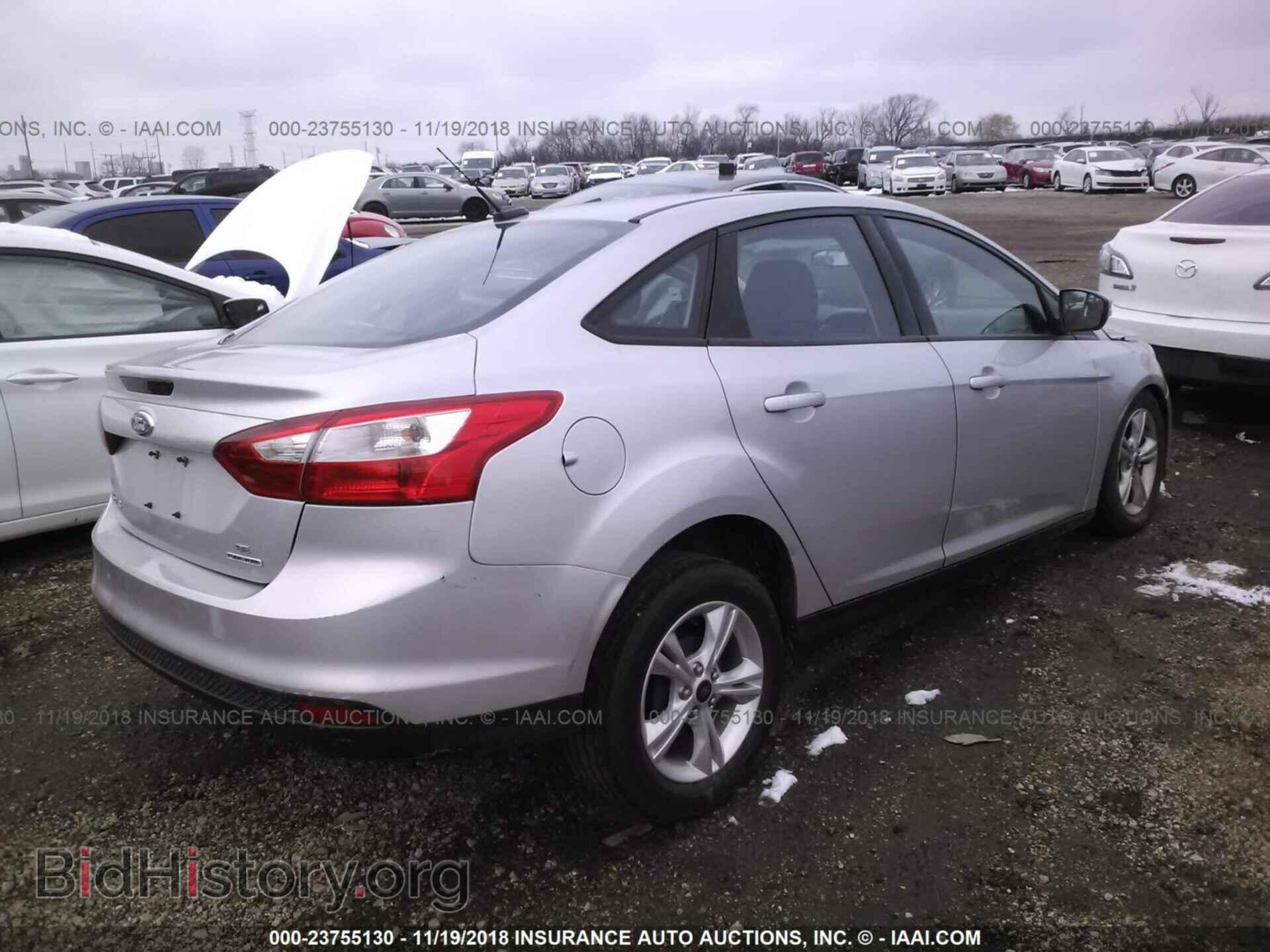 2014 Ford Focus - VIN: 1FADP3F21EL353995 - Фото 4