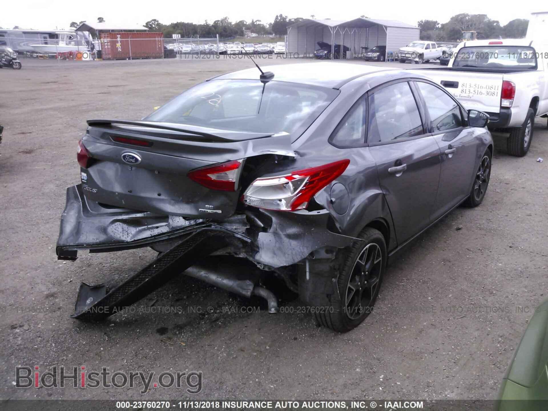 2013 Ford Focus - VIN: 1FADP3F21DL232043 - Фото 4