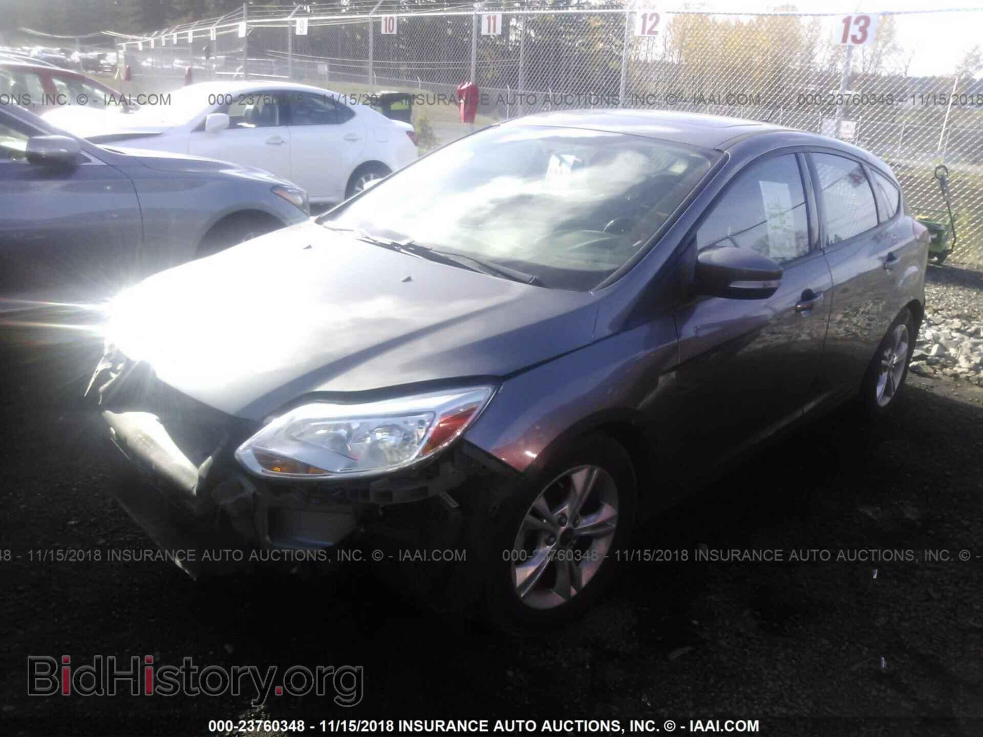 2014 Ford Focus - VIN: 1FADP3K29EL375619 - Фото 2