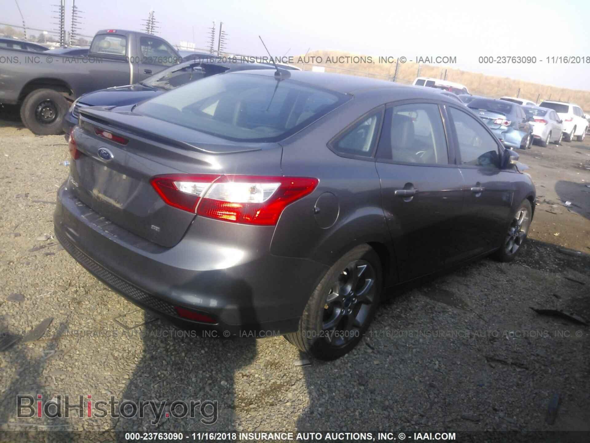 2014 Ford Focus - VIN: 1FADP3F28EL219579 - Photo 4