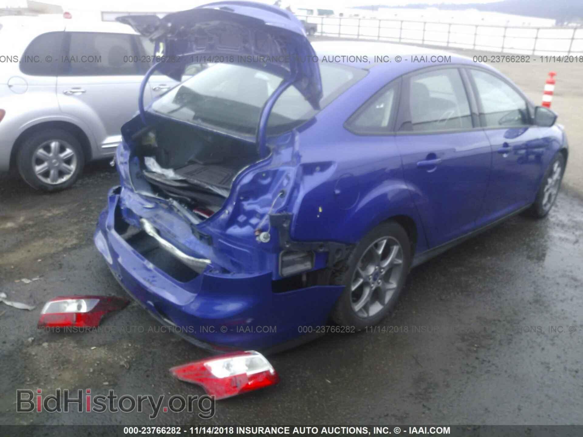 2014 Ford Focus - VIN: 1FADP3F29EL123492 - Фото 4