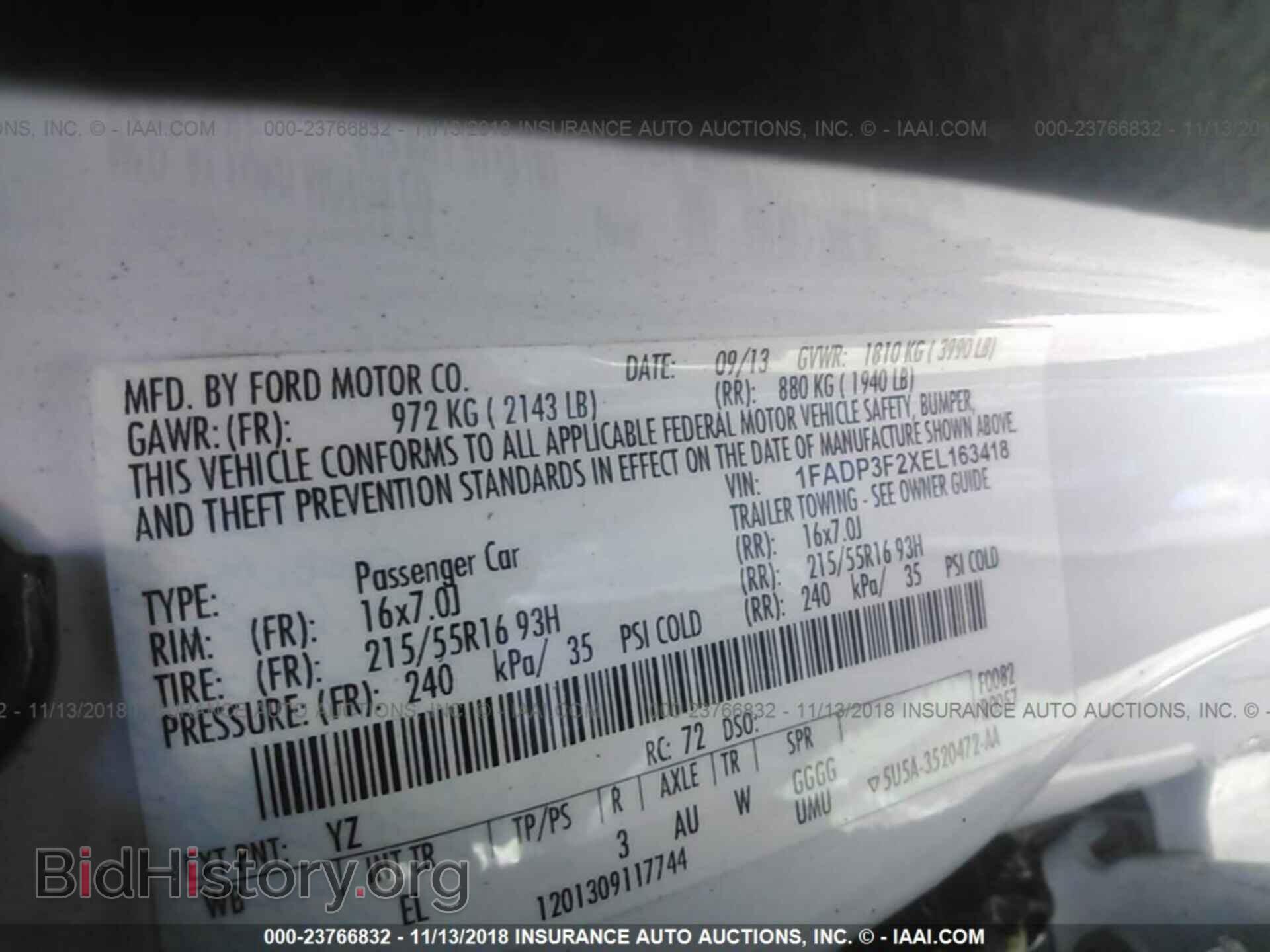 2014 Ford Focus - VIN: 1FADP3F2XEL163418 - Photo 9
