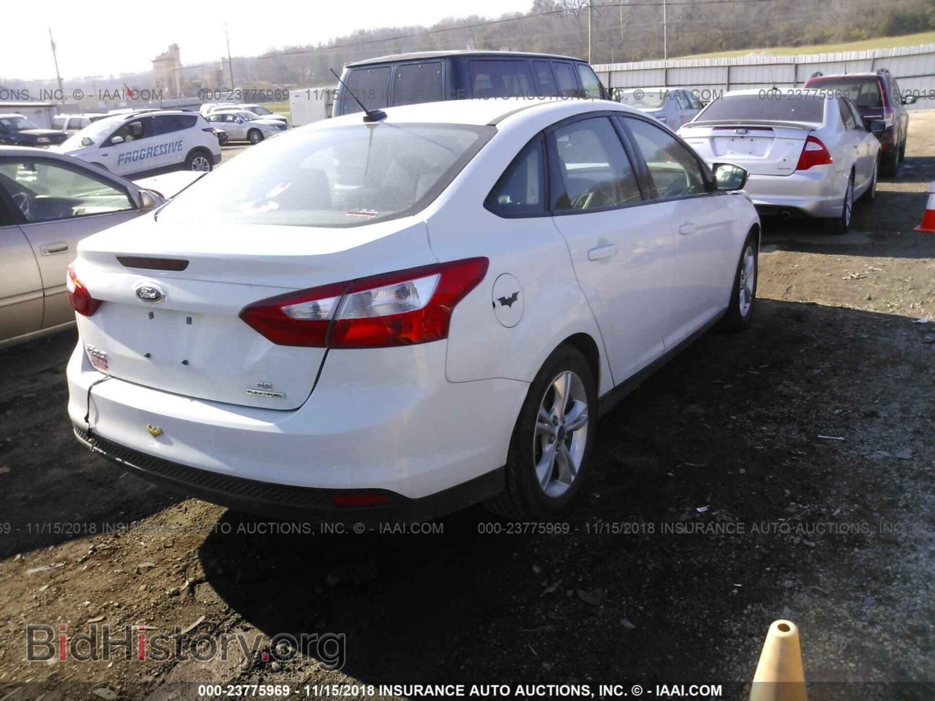 2014 FORD FOCUS - VIN: 1FADP3F20EL142612 - Photo 4