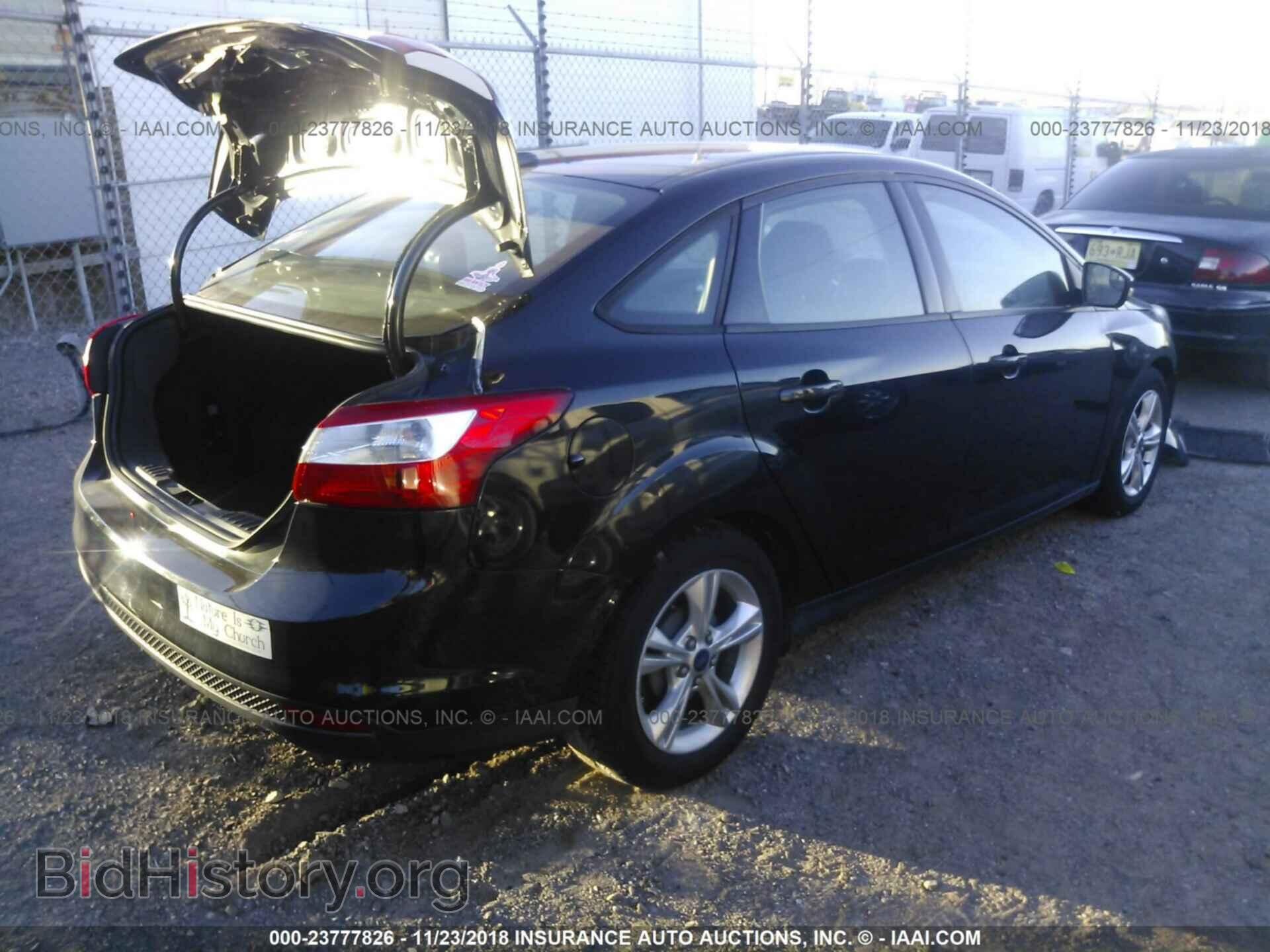 2014 Ford Focus - VIN: 1FADP3F21EL286637 - Photo 4