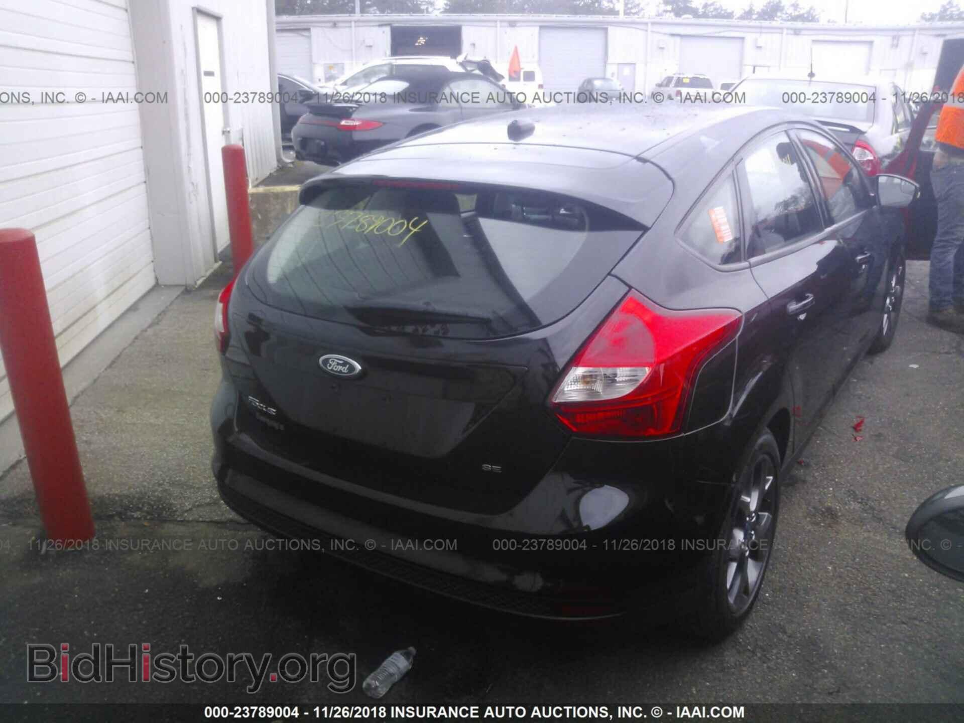 2014 Ford Focus - VIN: 1FADP3K21EL201933 - Фото 4