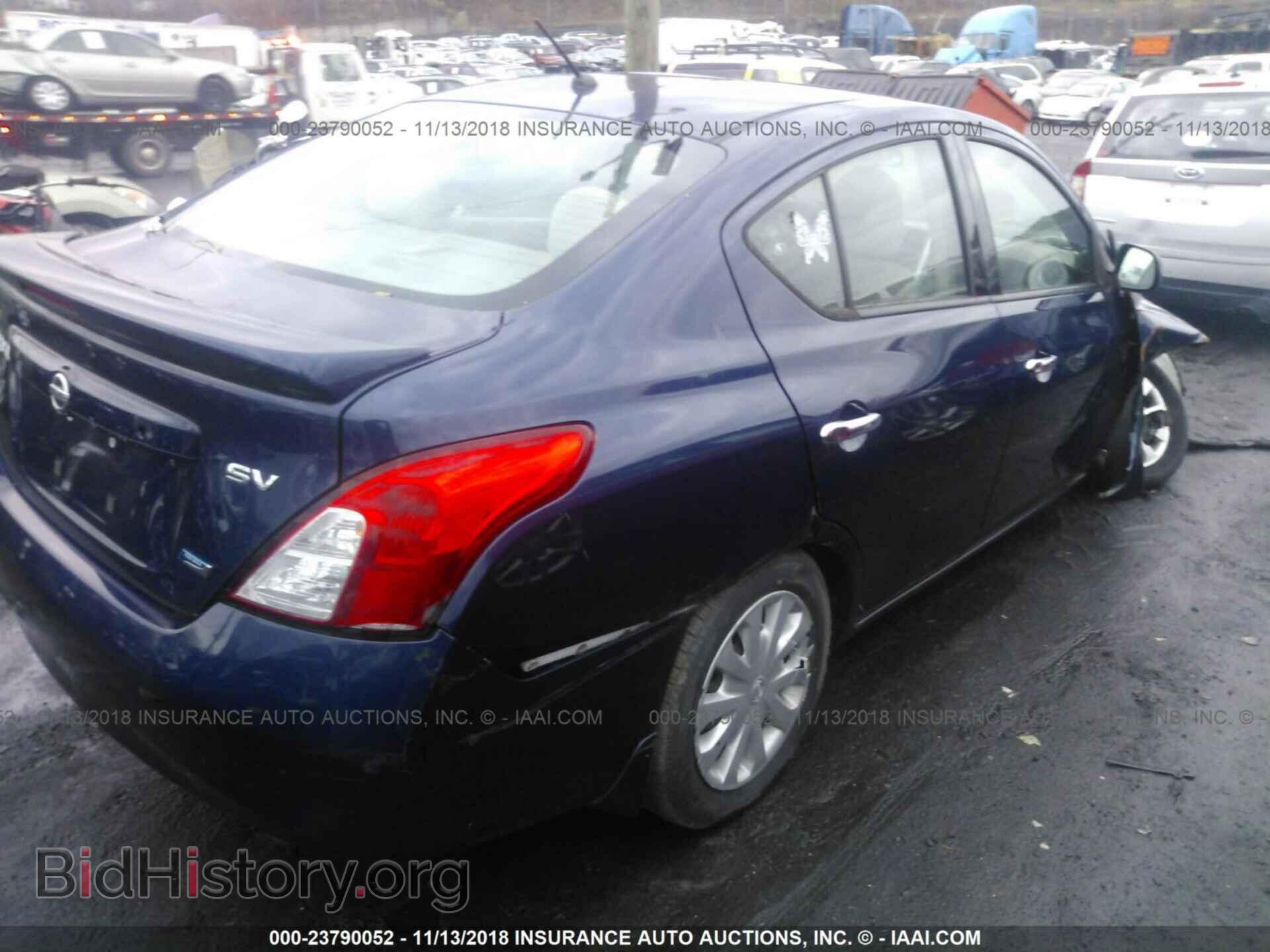 2014 Nissan Versa - VIN: 3N1CN7AP1EL810995 - Фото 4