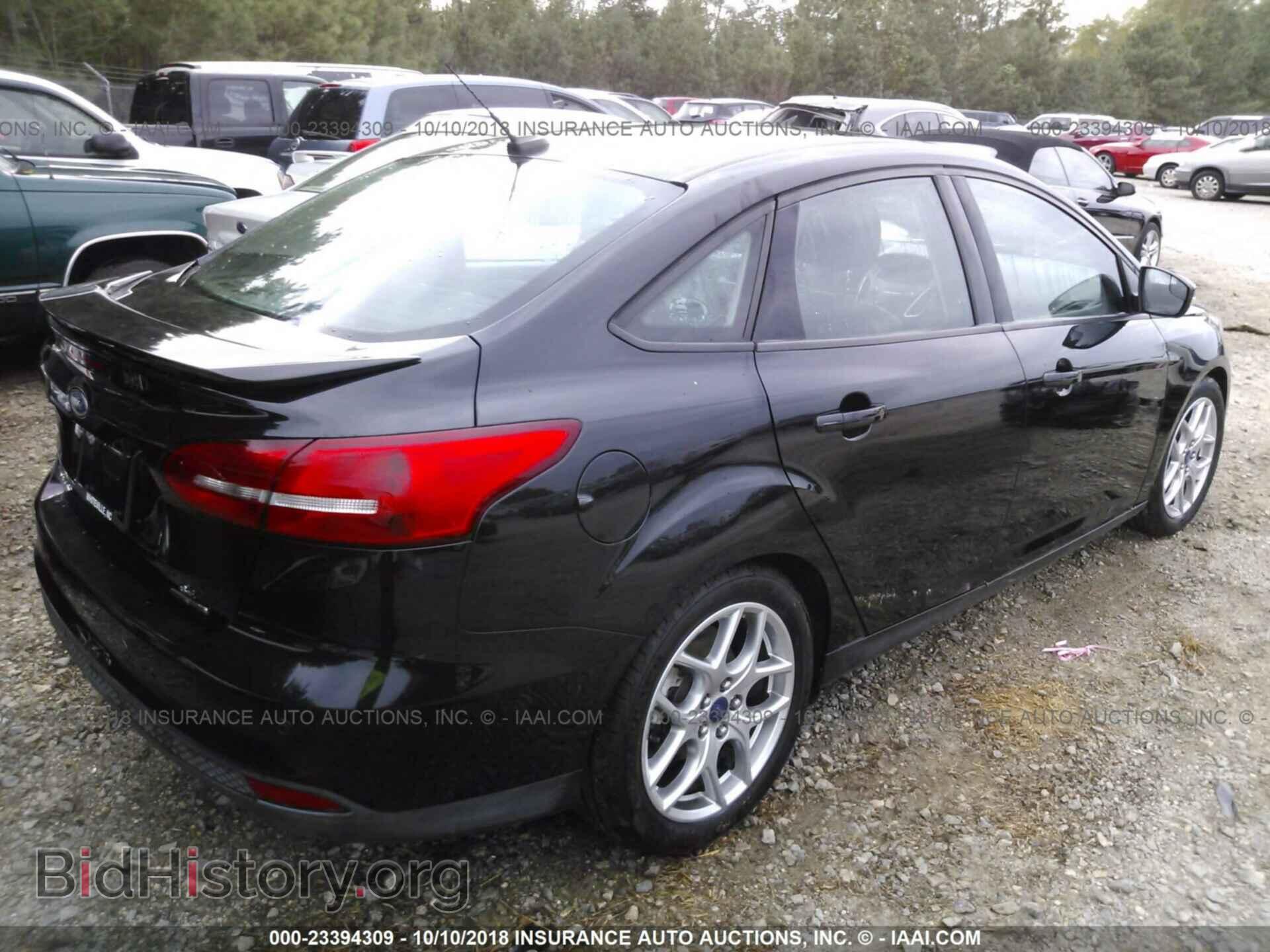 2015 FORD FOCUS - VIN: 1FADP3F21FL311182 - Photo 4