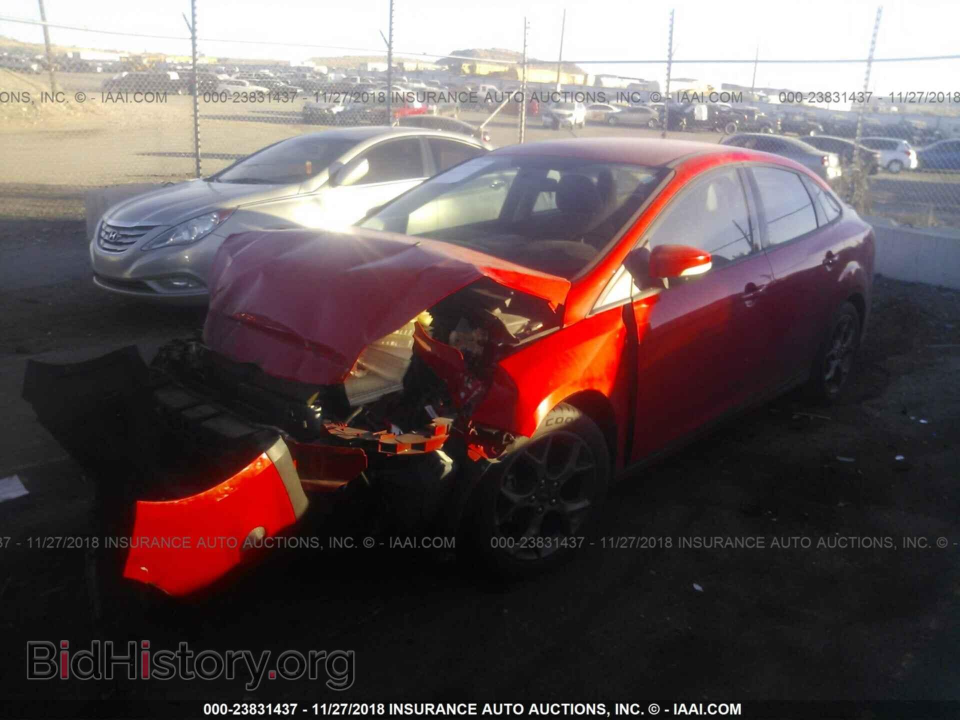 2013 Ford Focus - VIN: 1FADP3F24DL374418 - Фото 2