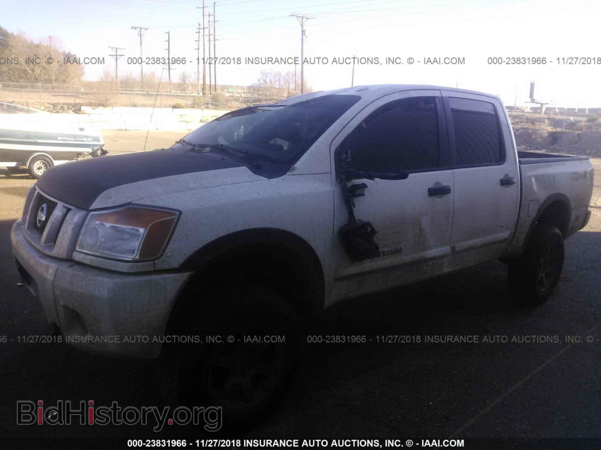 2014 Nissan Titan - VIN: 1N6AA0EC1EN506304 - Фото 2