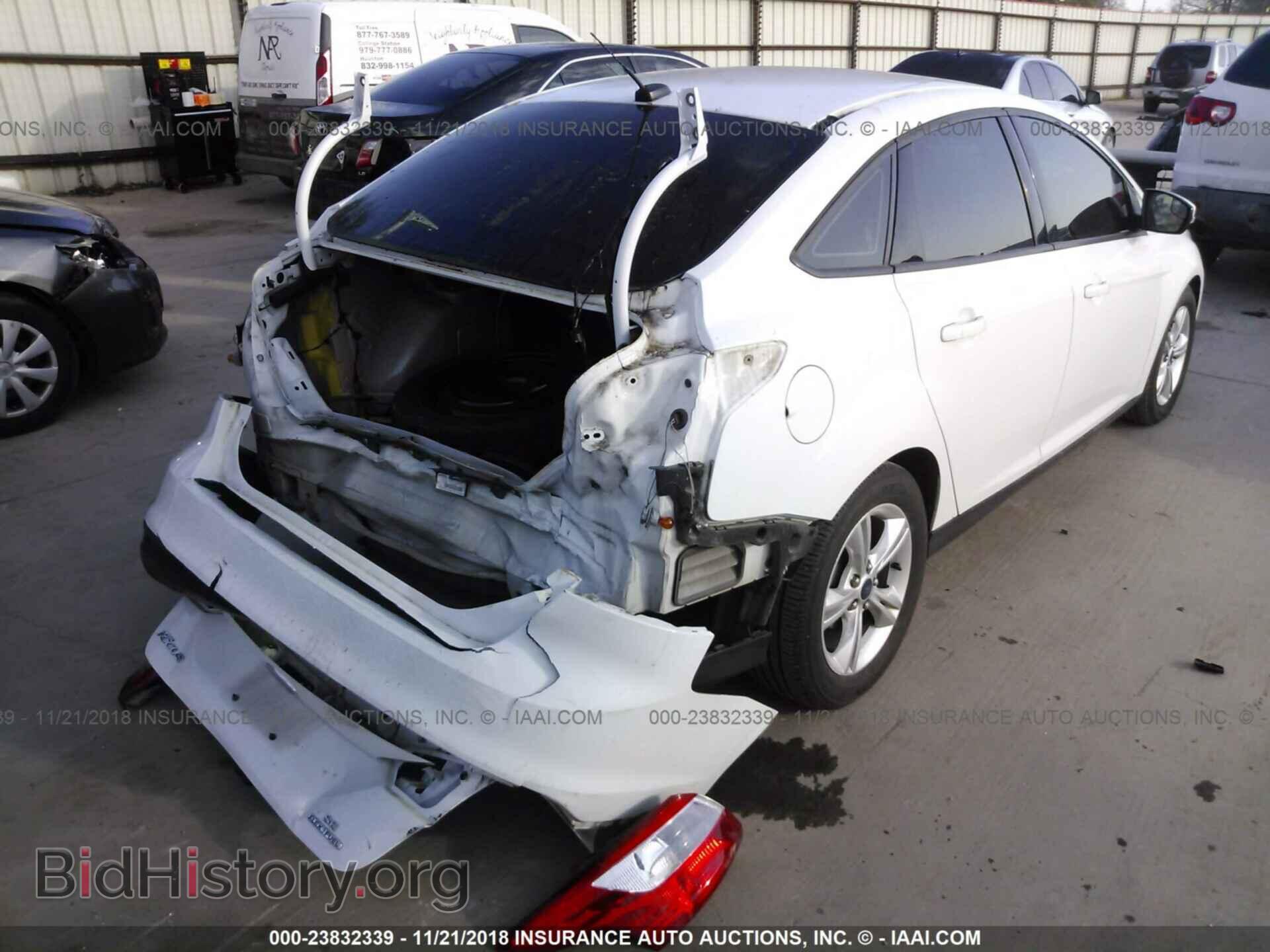 2014 Ford Focus - VIN: 1FADP3F27EL208413 - Photo 4