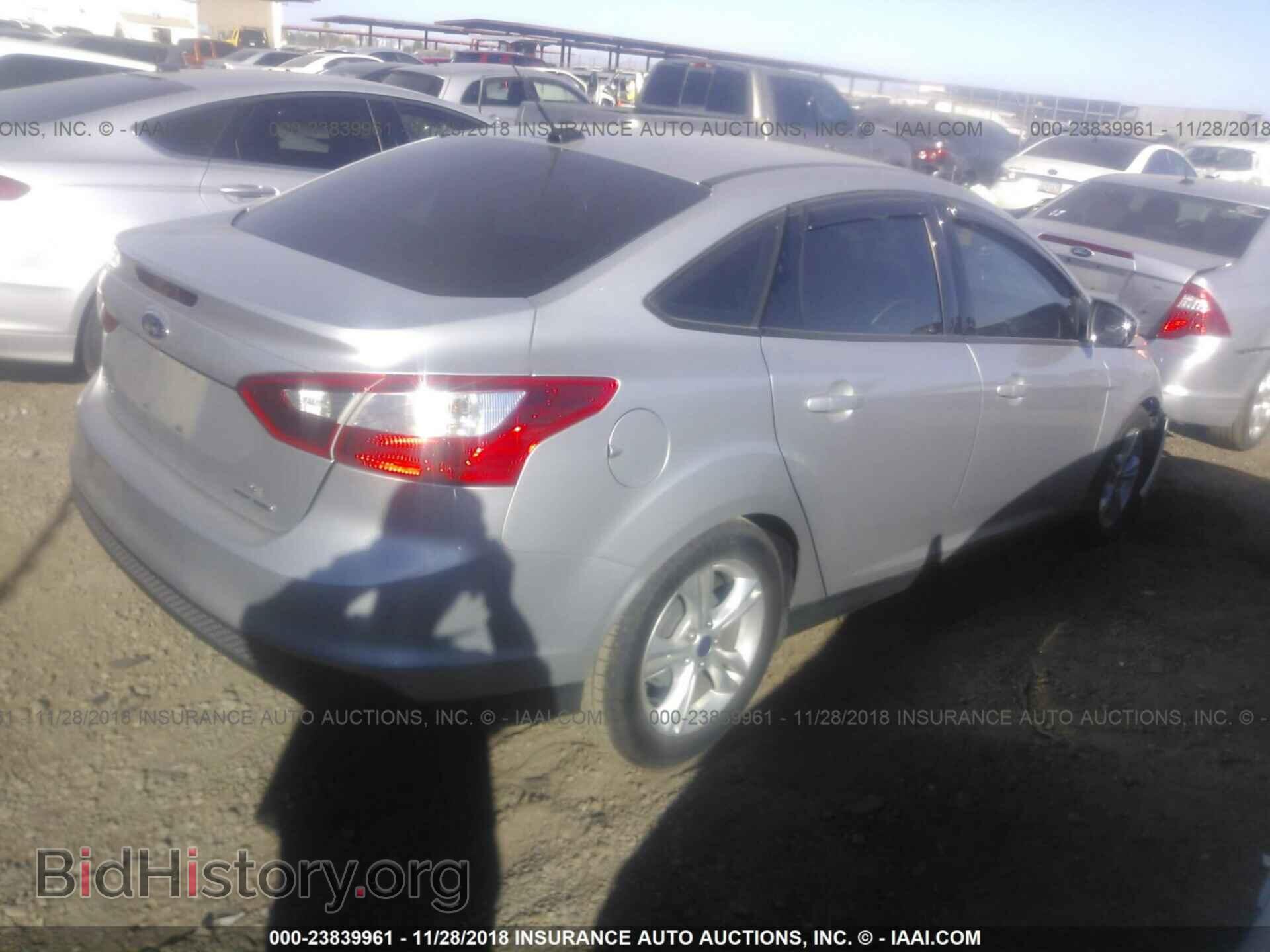 2014 Ford Focus - VIN: 1FADP3F26EL140461 - Photo 4