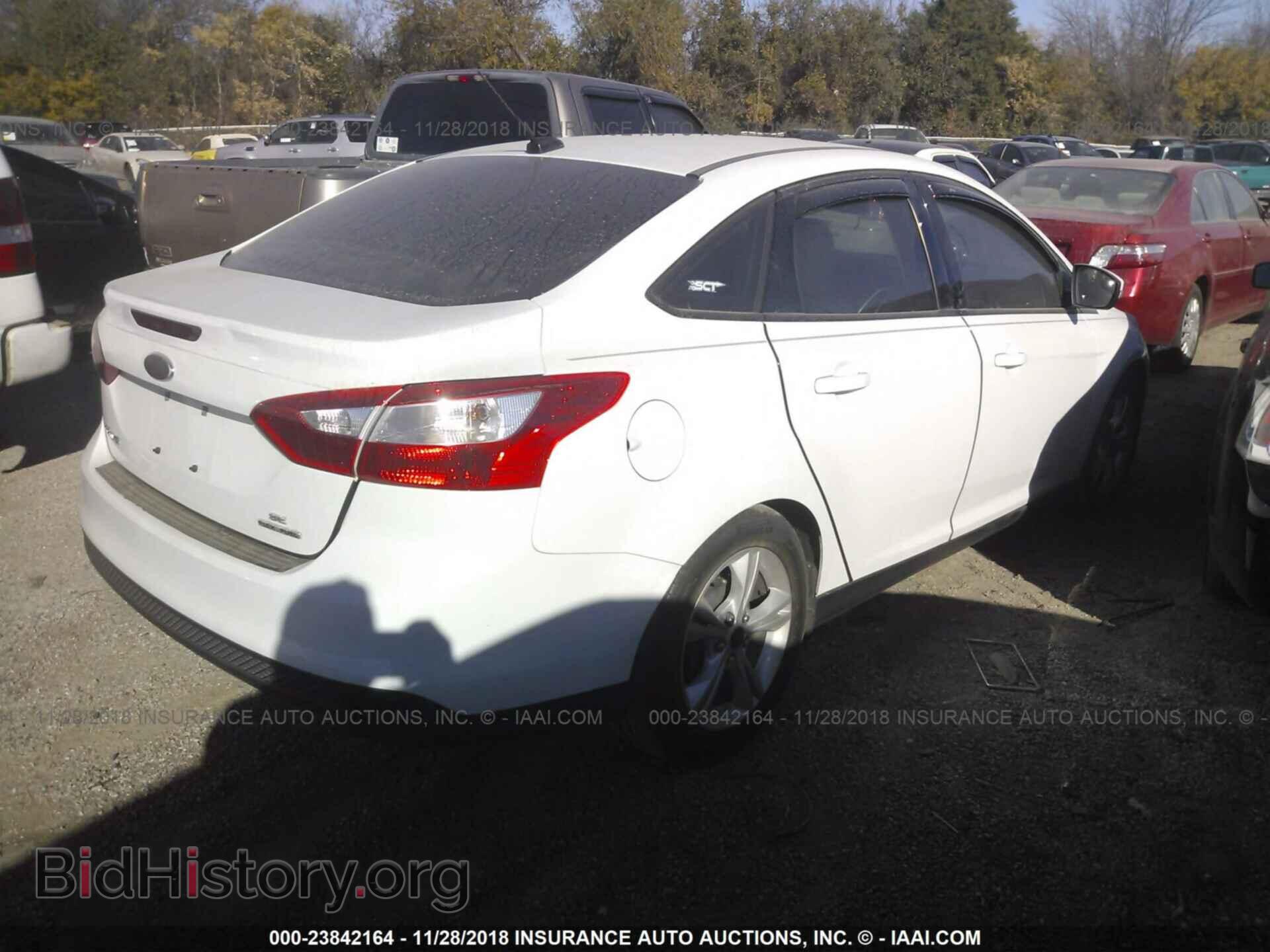 2014 Ford Focus - VIN: 1FADP3F26EL430618 - Photo 4