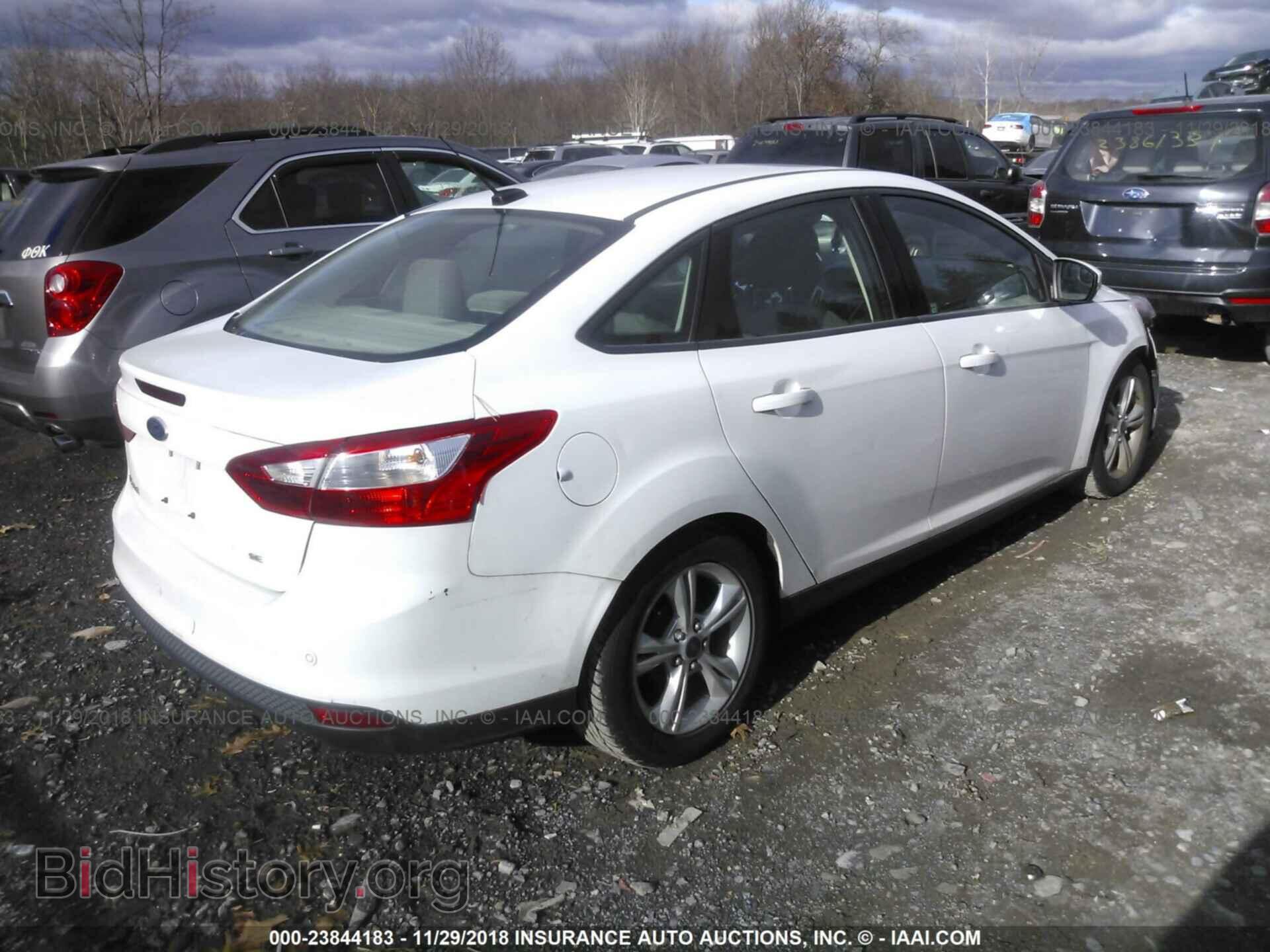 2014 FORD FOCUS - VIN: 1FADP3F21EL377620 - Photo 4