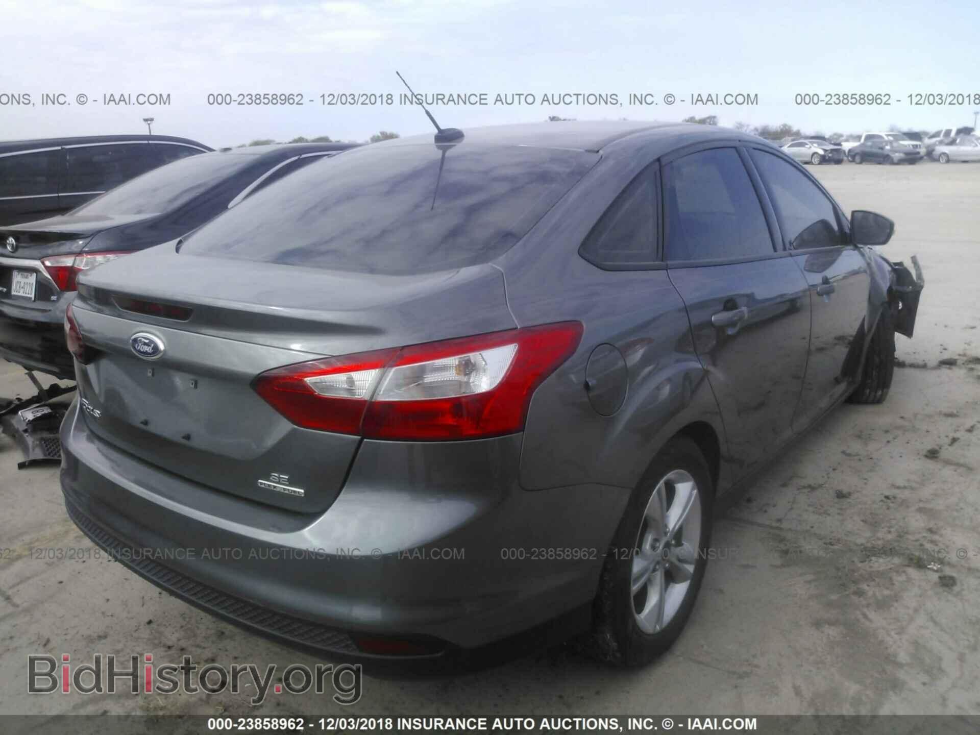 2014 Ford Focus - VIN: 1FADP3F29EL381432 - Photo 4