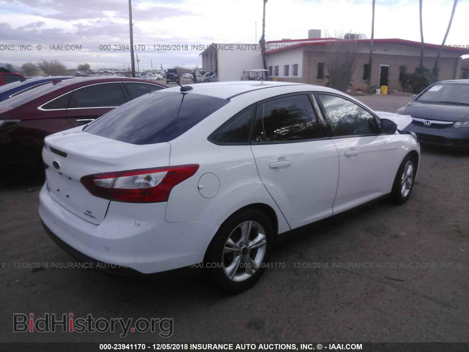 2014 Ford Focus - VIN: 1FADP3F23EL169934 - Photo 4