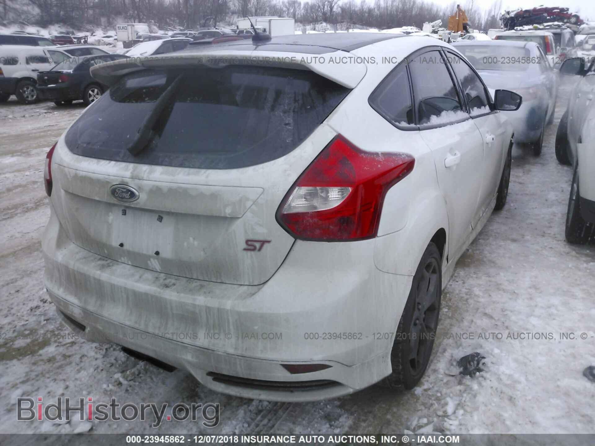 2014 Ford Focus - VIN: 1FADP3L97EL330237 - Photo 4