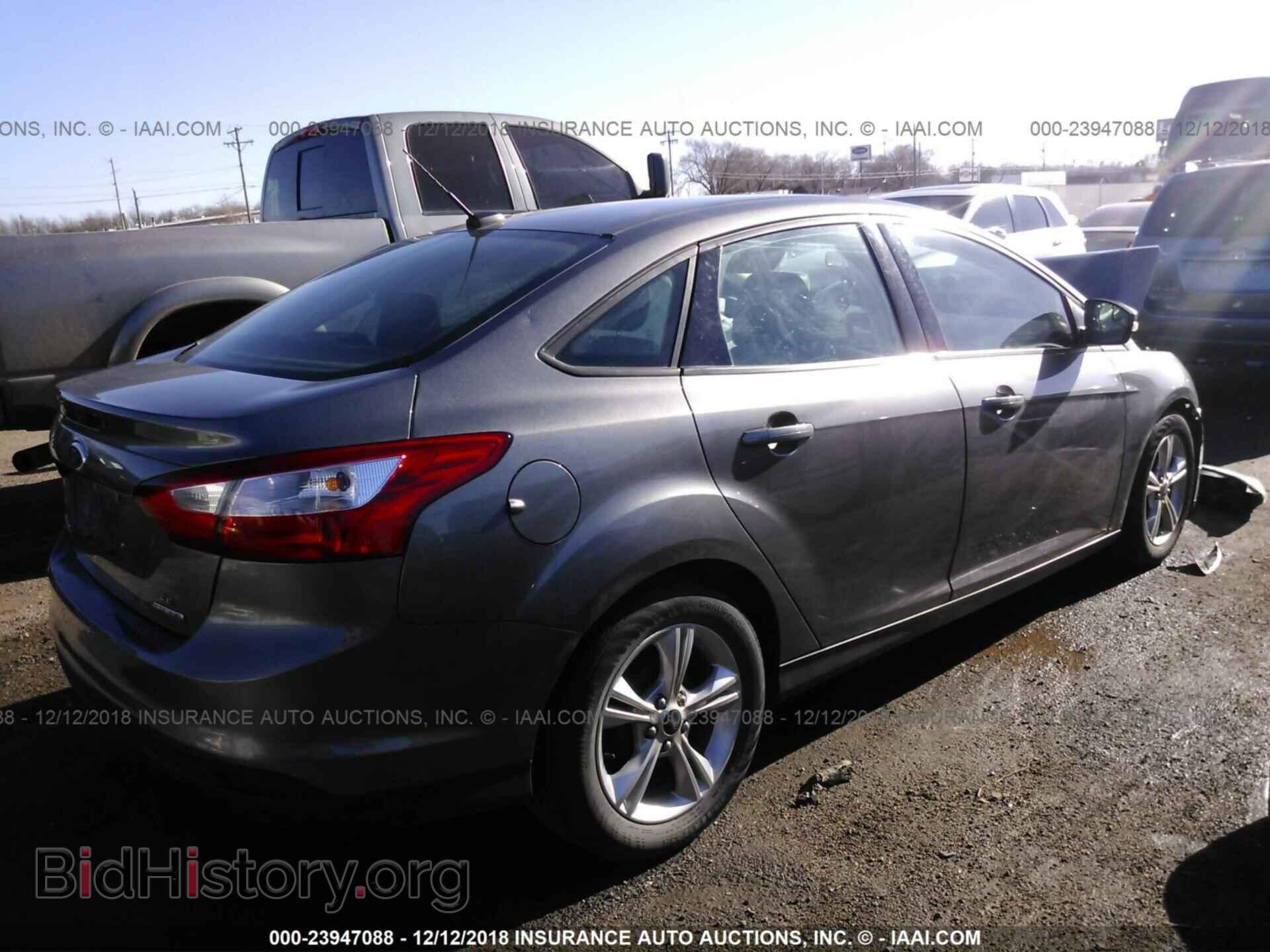 2014 FORD FOCUS - VIN: 1FADP3F21EL311357 - Photo 4