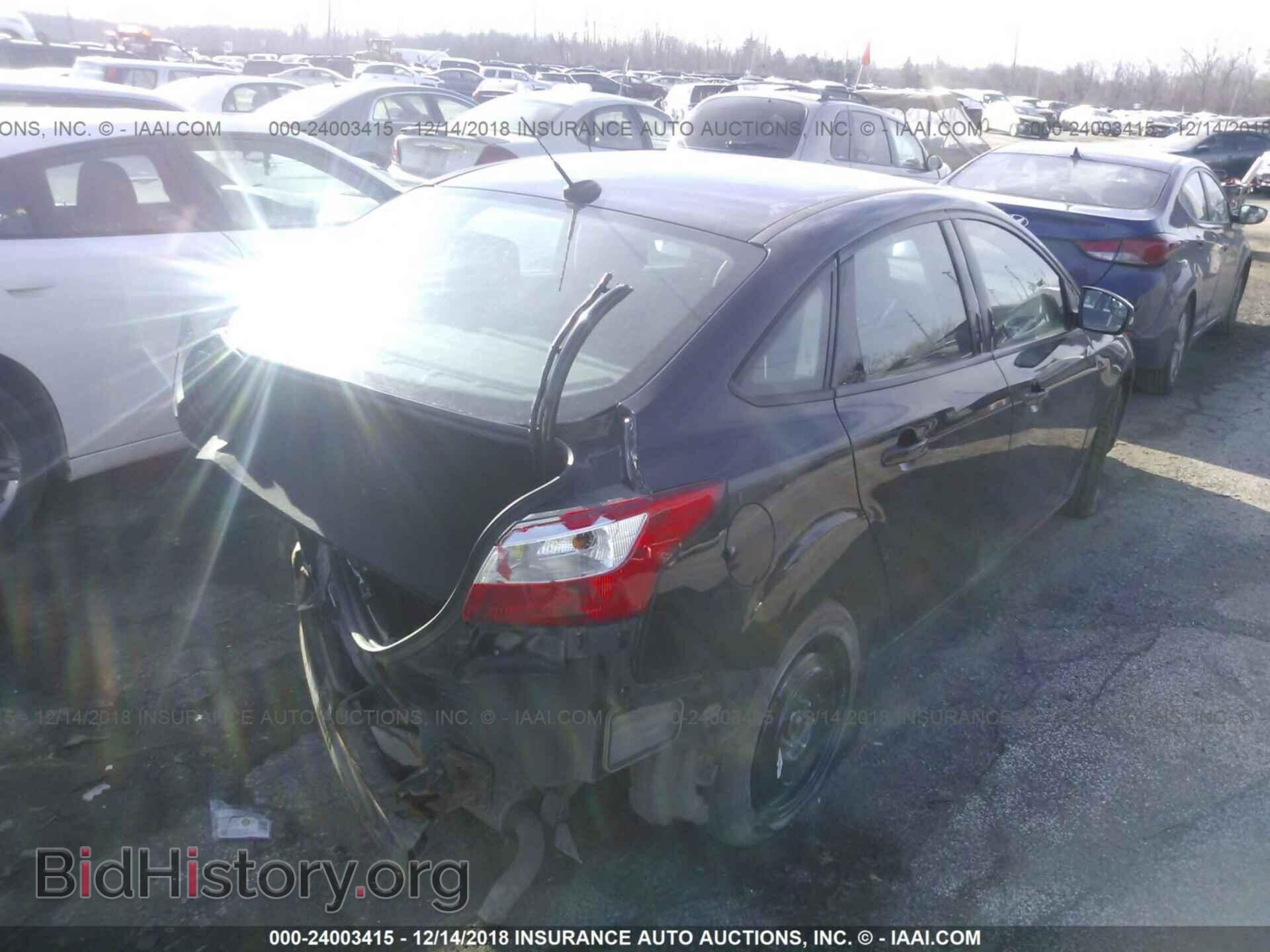 2014 FORD FOCUS - VIN: 1FADP3F2XEL346883 - Photo 4