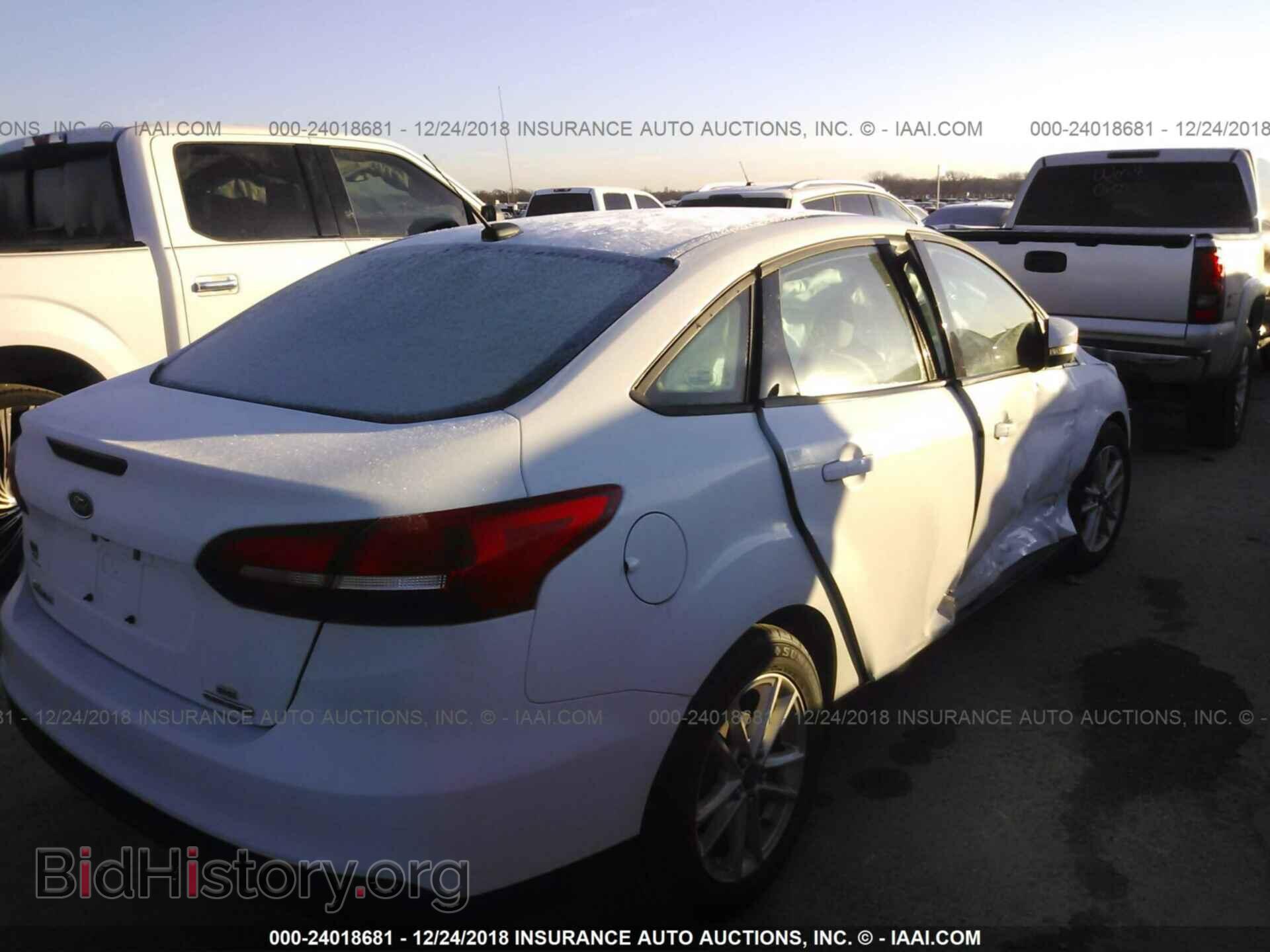 2015 FORD FOCUS - VIN: 1FADP3F28FL345099 - Photo 4