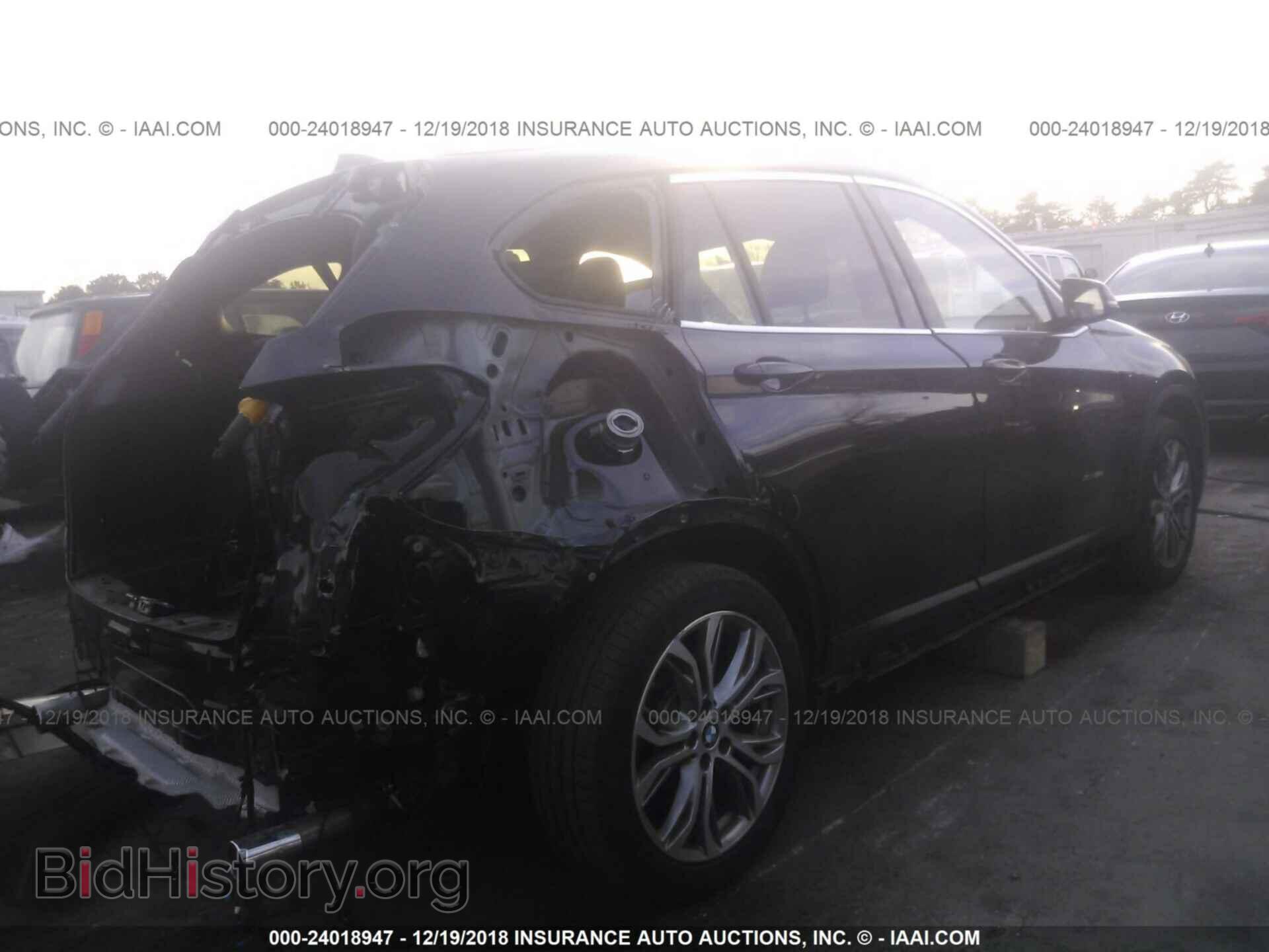 2017 BMW X1 - VIN: WBXHT3Z32H4A54225 - Фото 4