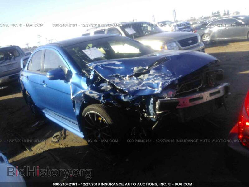 2015 Mitsubishi LANCER Evolution (VIN JA32W7FVXFU028598) — photo 1 of 10, IAAI, damage: right front