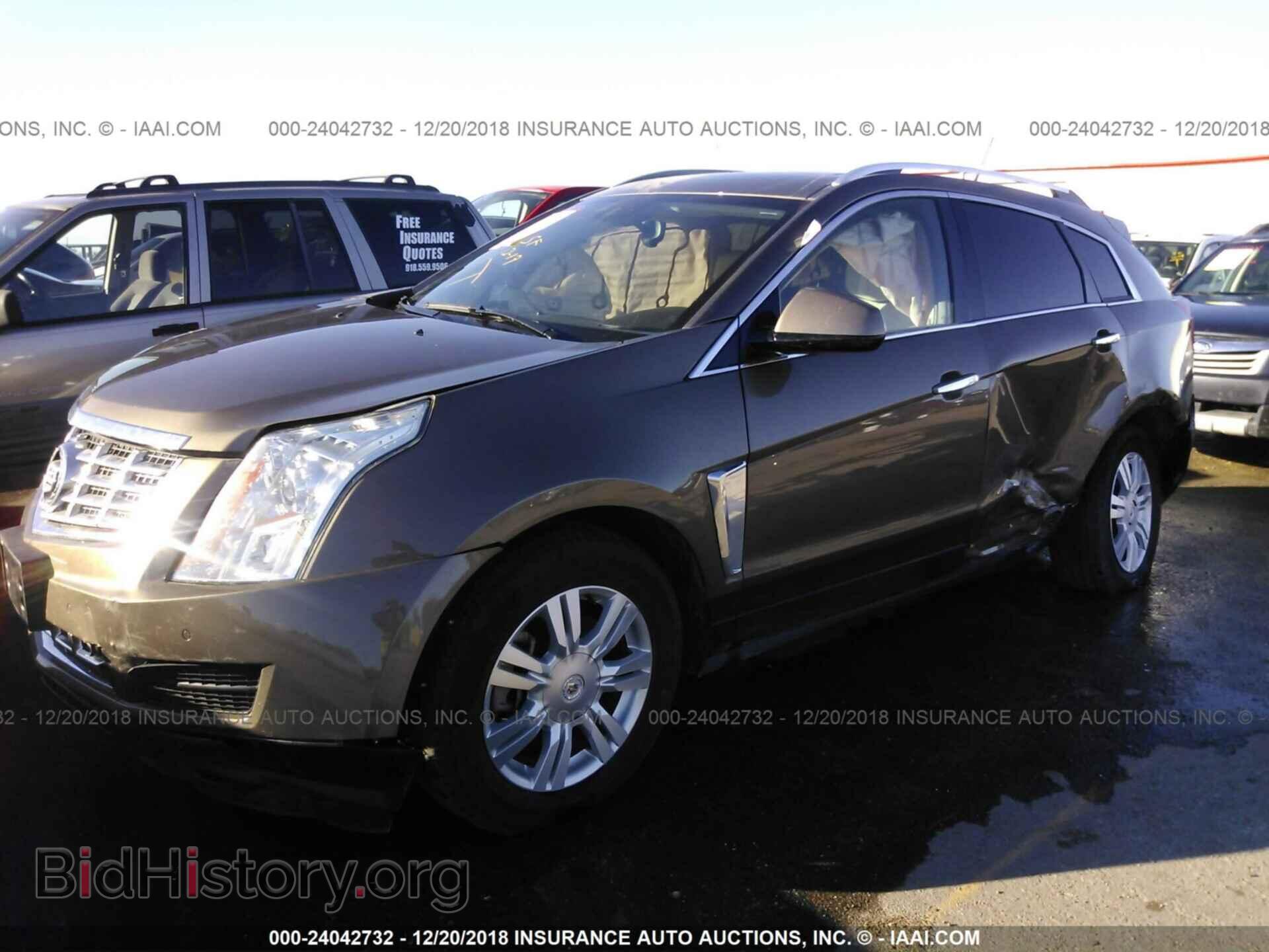 2014 CADILLAC SRX - VIN: 3GYFNBE37ES642669 - Фото 2