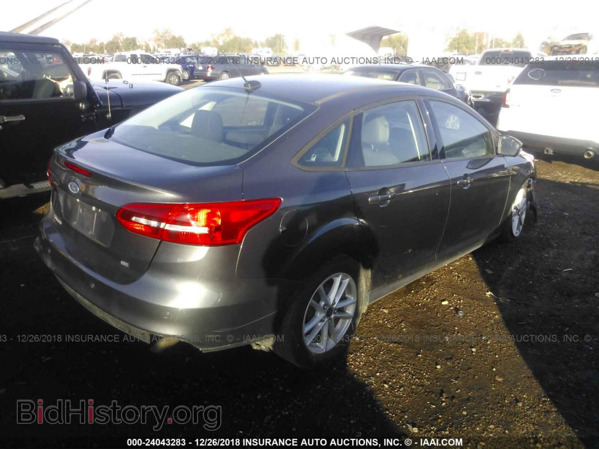 2015 FORD FOCUS - VIN: 1FADP3F22FL324491 - Photo 4