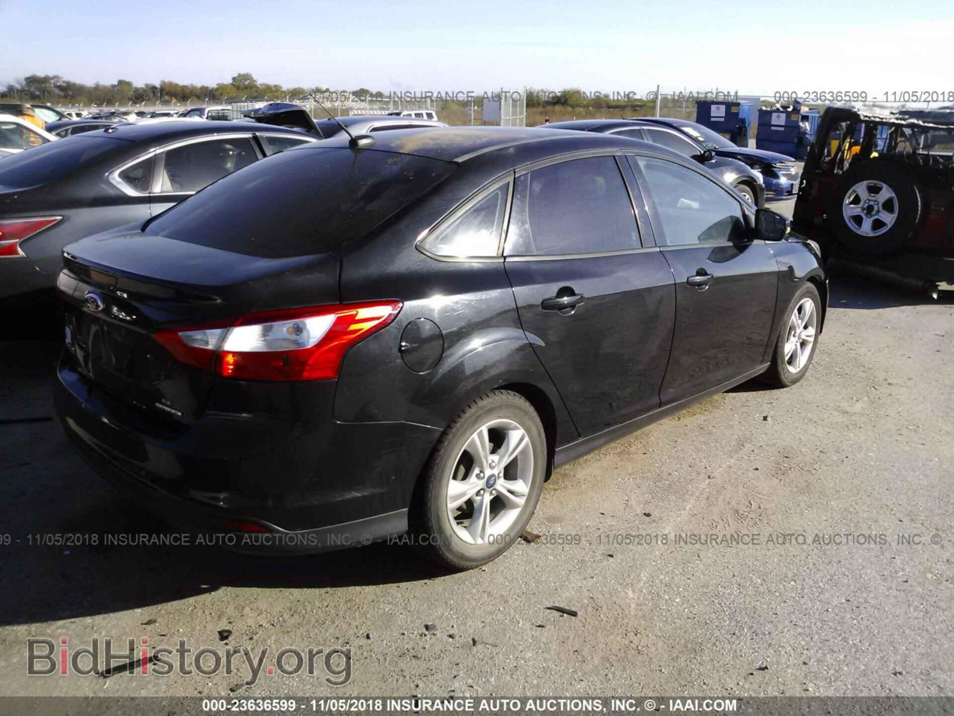 2014 FORD FOCUS - VIN: 1FADP3F21EL123129 - Photo 4