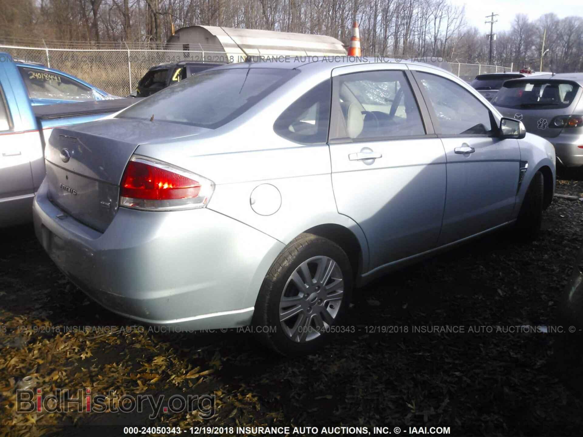 2009 FORD FOCUS - VIN: 1FAHP37N49W157077 - Photo 4