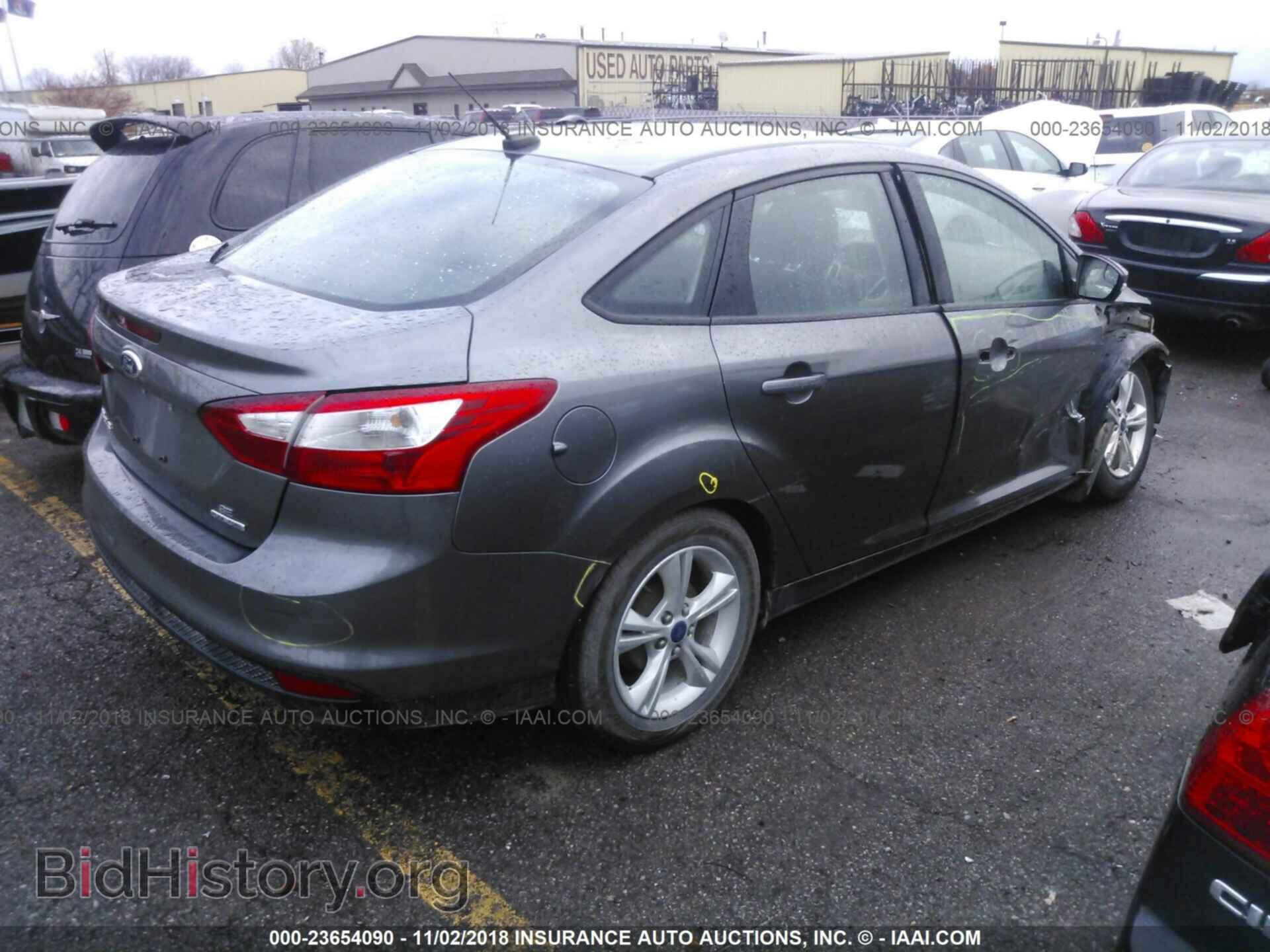 2014 FORD FOCUS - VIN: 1FADP3F21EL405903 - Photo 4