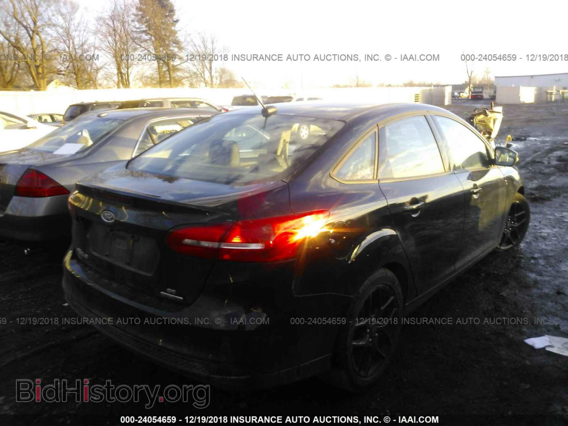 2016 FORD FOCUS - VIN: 1FADP3F21GL394632 - Photo 4