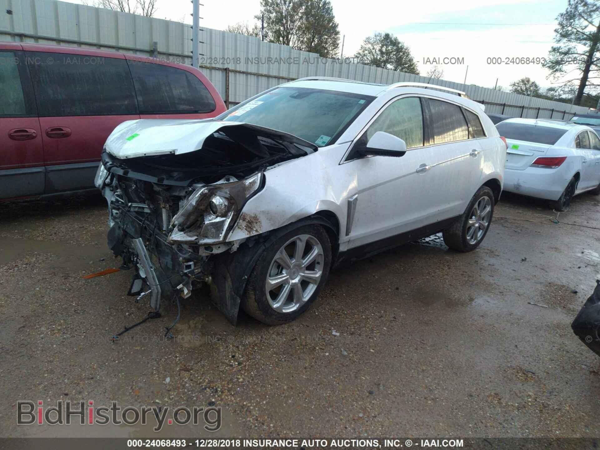 2013 CADILLAC SRX - VIN: 3GYFNEE37DS593182 - Фото 2