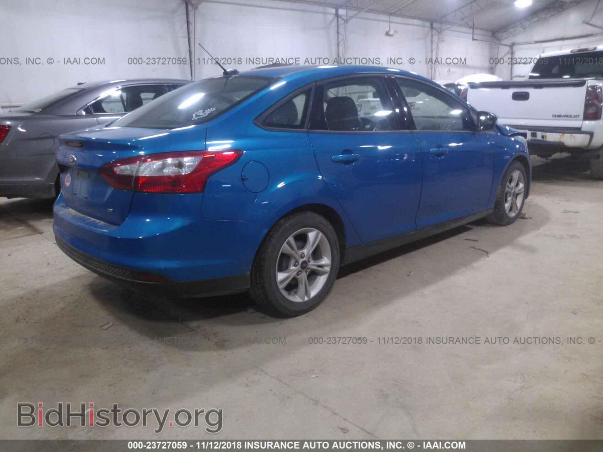 2014 FORD FOCUS - VIN: 1FADP3F21EL449688 - Photo 4