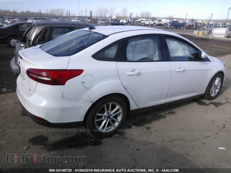 2016 Ford FOCUS (VIN 1FADP3F23GL283256) — фото 4 из 10