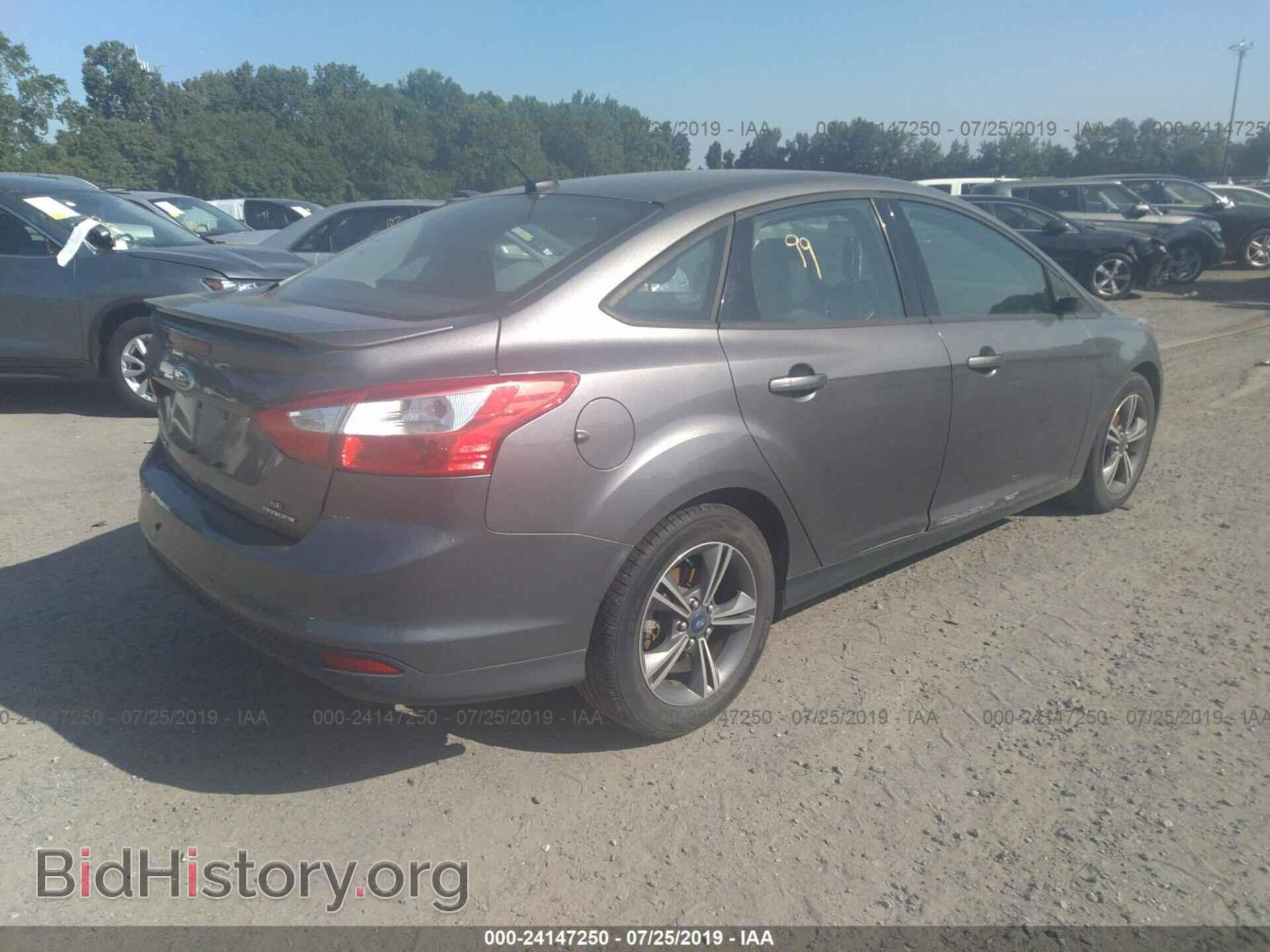 2014 FORD FOCUS - VIN: 1FADP3F22EL114925 - Photo 4