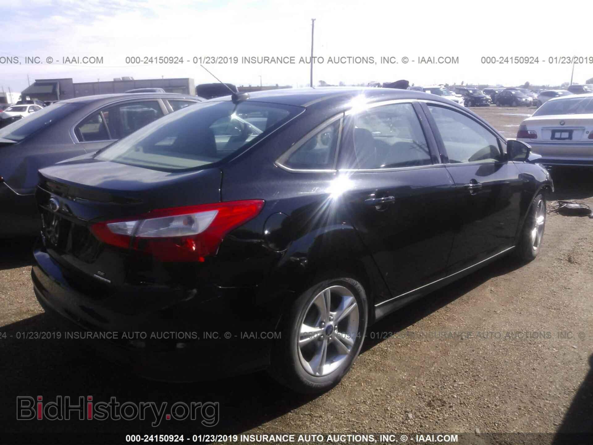 2014 FORD FOCUS - VIN: 1FADP3F23EL301266 - Photo 4