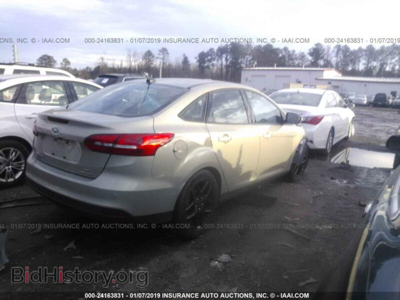2016 Ford FOCUS (VIN 1FADP3F25GL386713) — фото 4 из 10