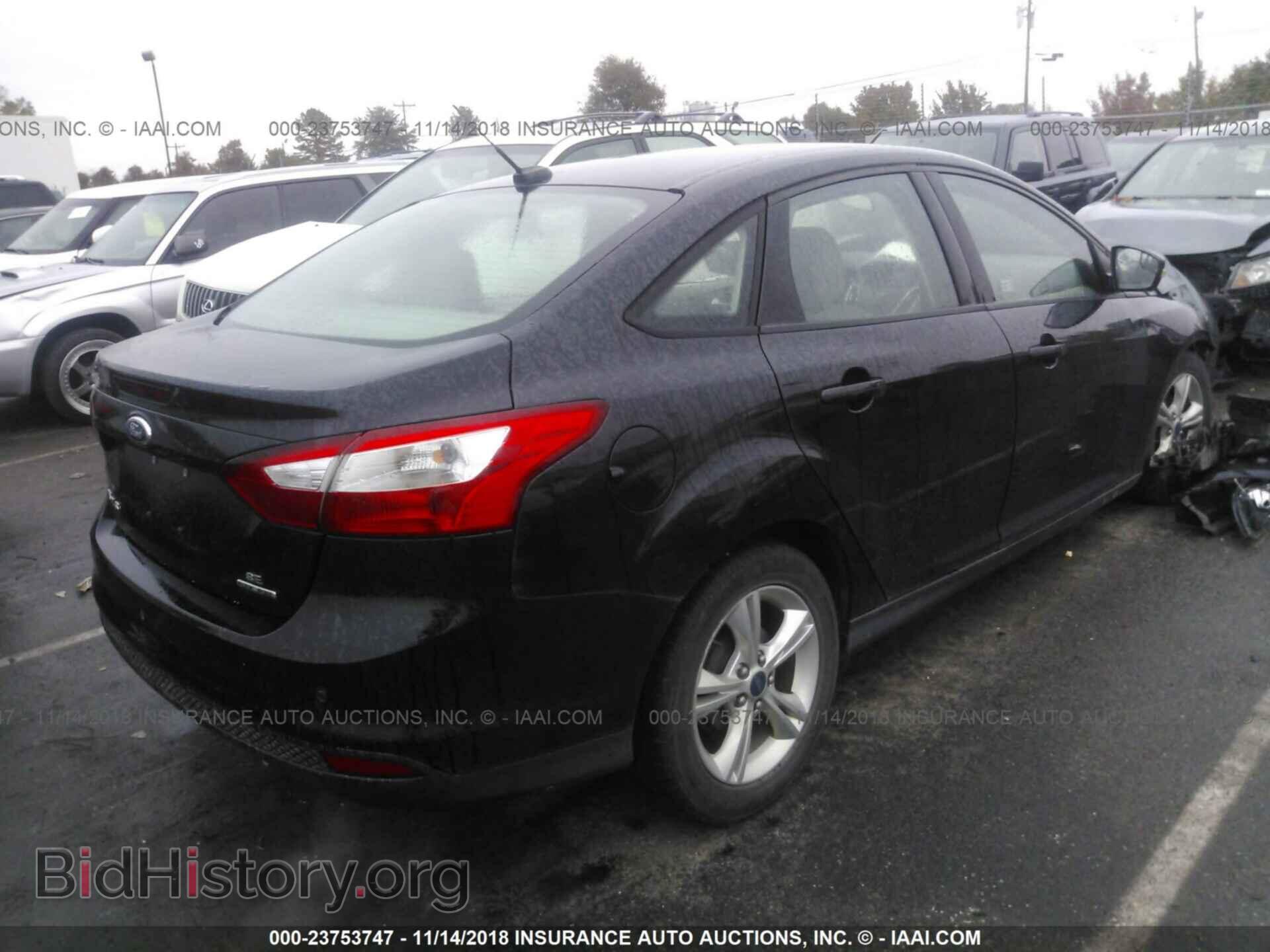 2014 FORD FOCUS - VIN: 1FADP3F25EL135848 - Photo 4