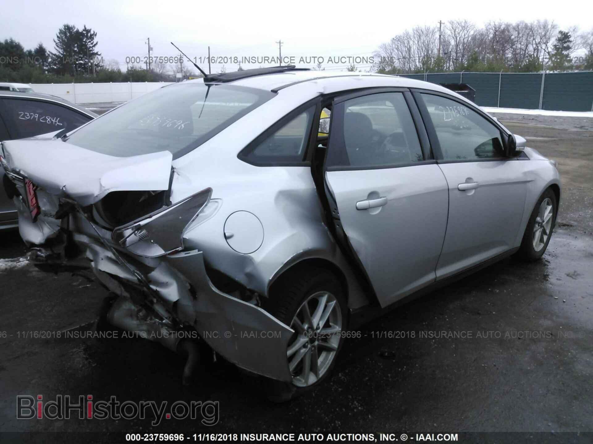 2015 FORD FOCUS - VIN: 1FADP3F21FL217822 - Photo 4