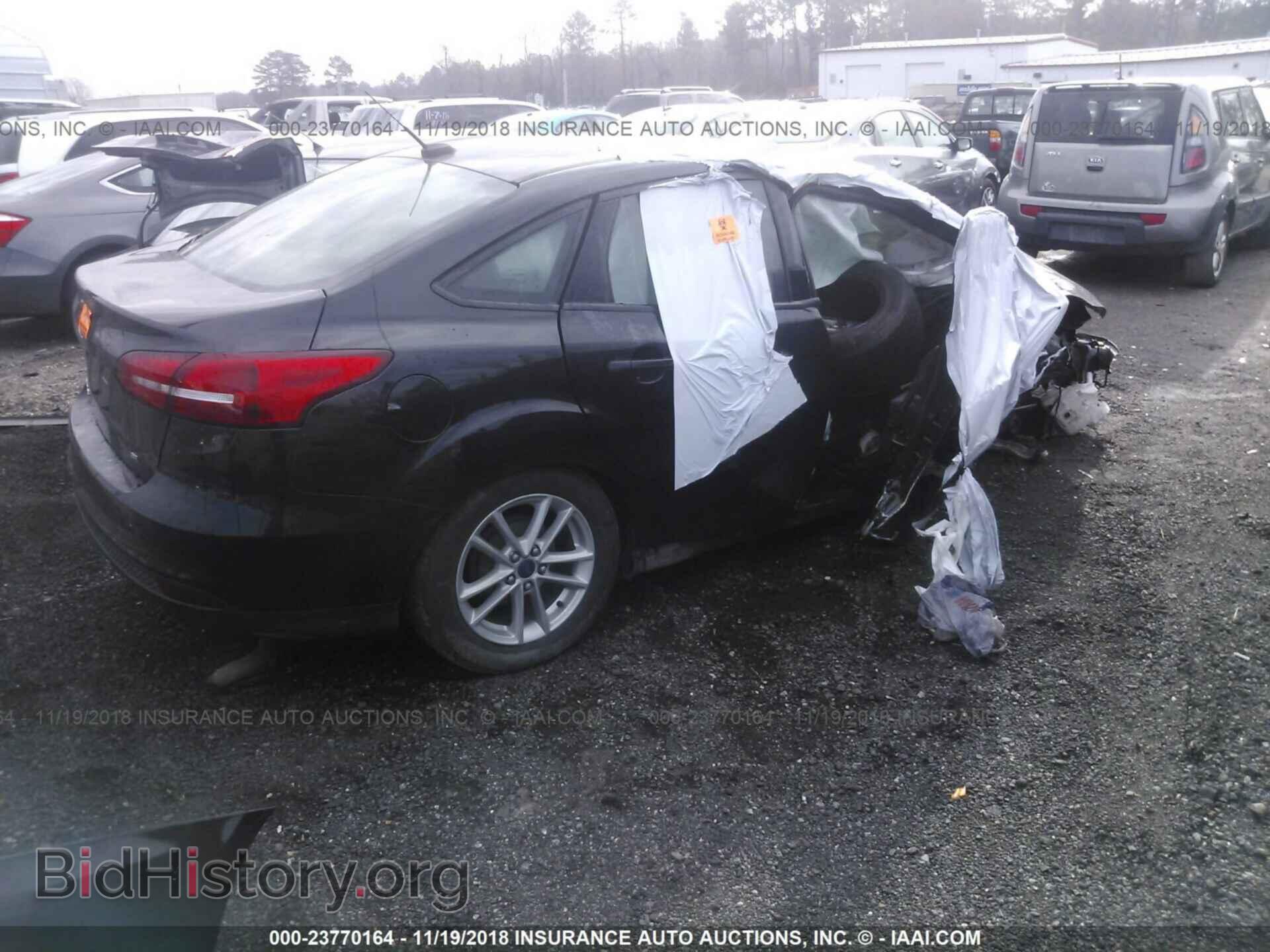 2015 FORD FOCUS - VIN: 1FADP3F20FL343184 - Photo 4
