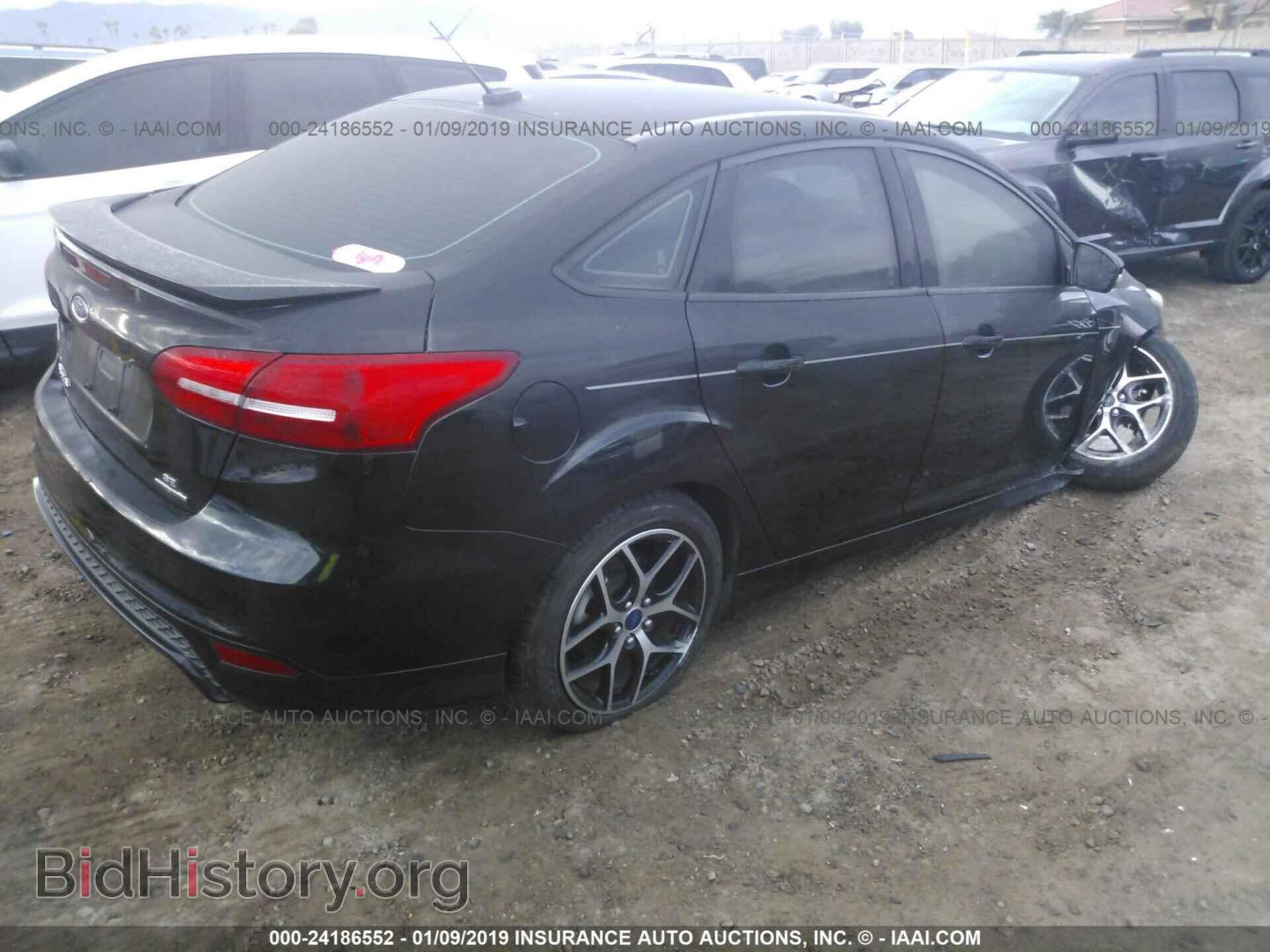 2015 FORD FOCUS - VIN: 1FADP3F27FL261940 - Photo 4