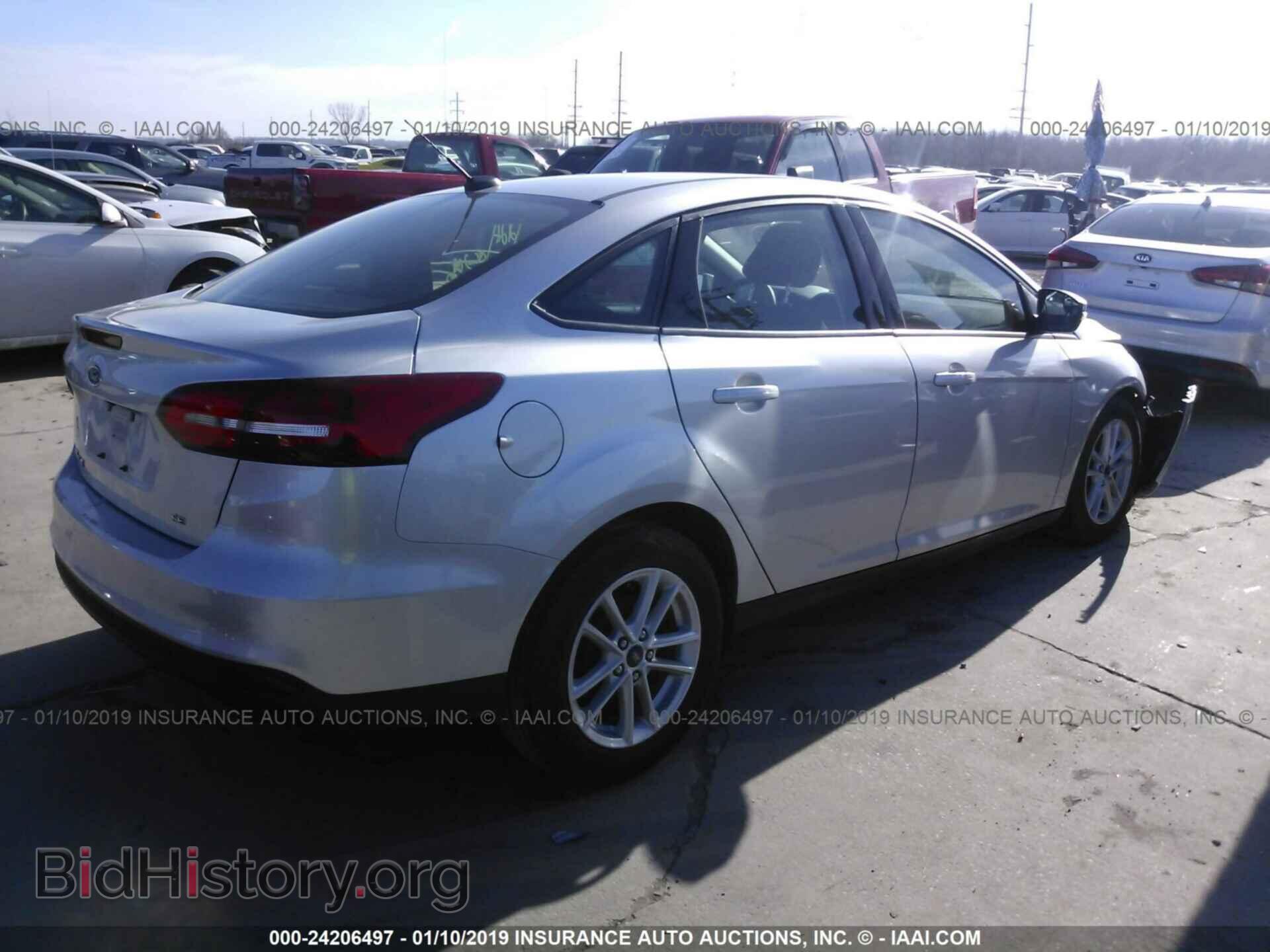 2017 FORD FOCUS - VIN: 1FADP3F21HL332942 - Photo 4
