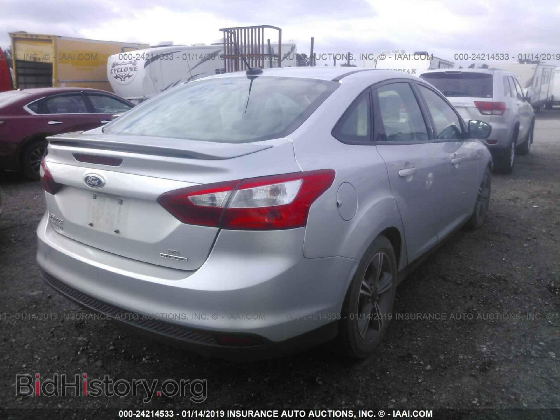 2014 FORD FOCUS - VIN: 1FADP3F21EL329535 - Photo 4