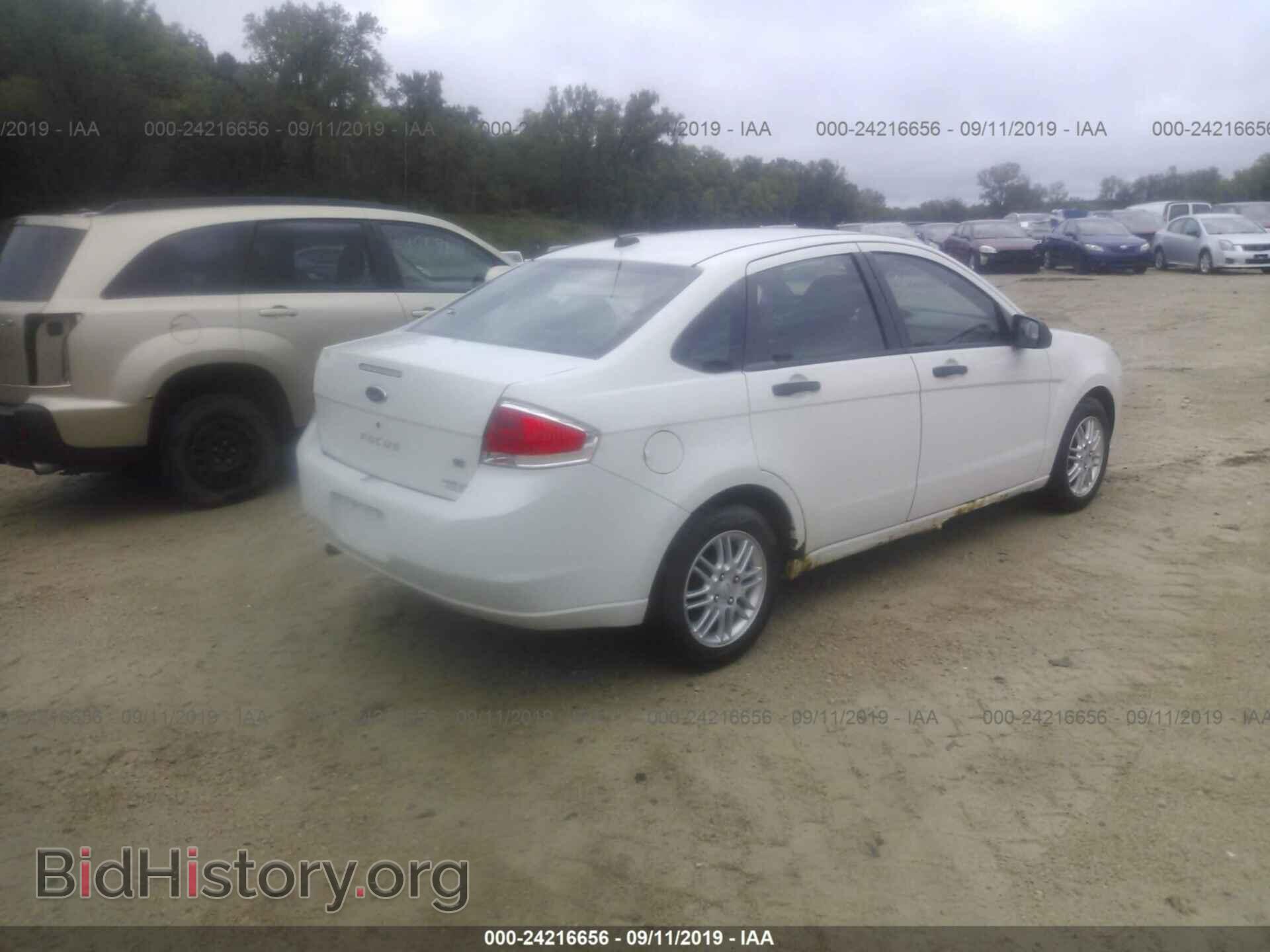 2009 FORD FOCUS - VIN: 1FAHP35N19W200728 - Photo 4