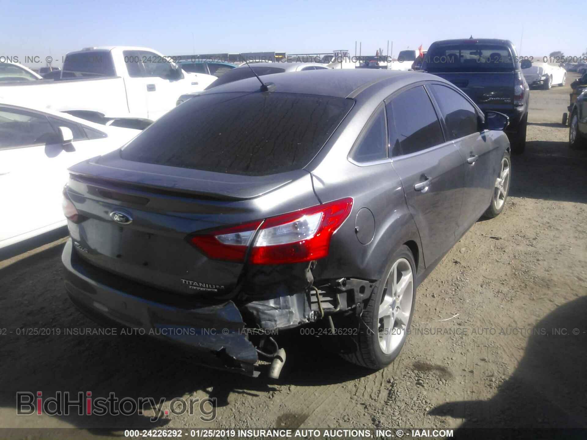 2014 FORD FOCUS - VIN: 1FADP3J28EL149945 - Photo 4
