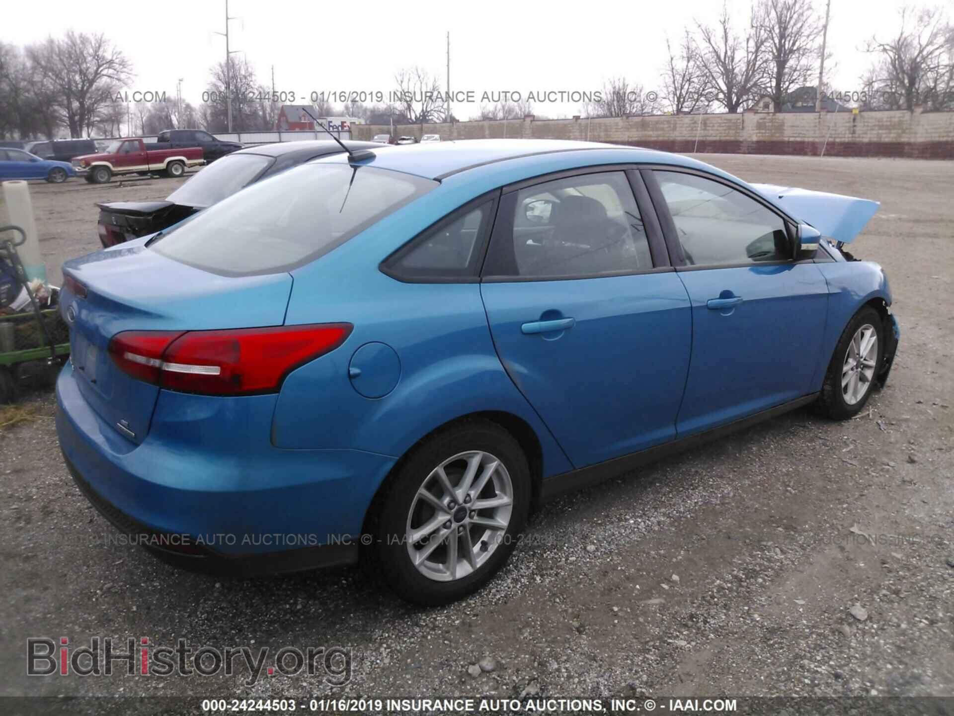 2015 FORD FOCUS - VIN: 1FADP3F20FL204267 - Photo 4