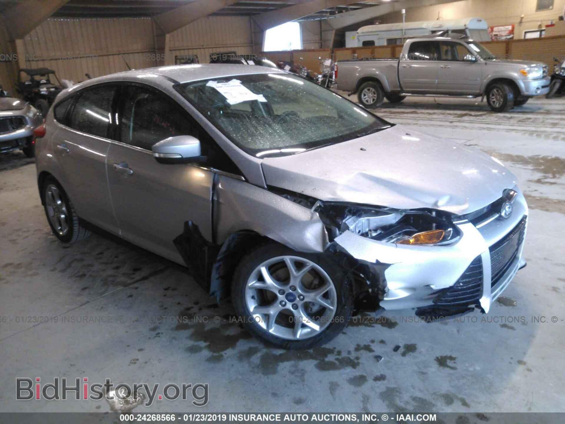 Фотография 1FADP3N23DL128848 - FORD FOCUS 2013